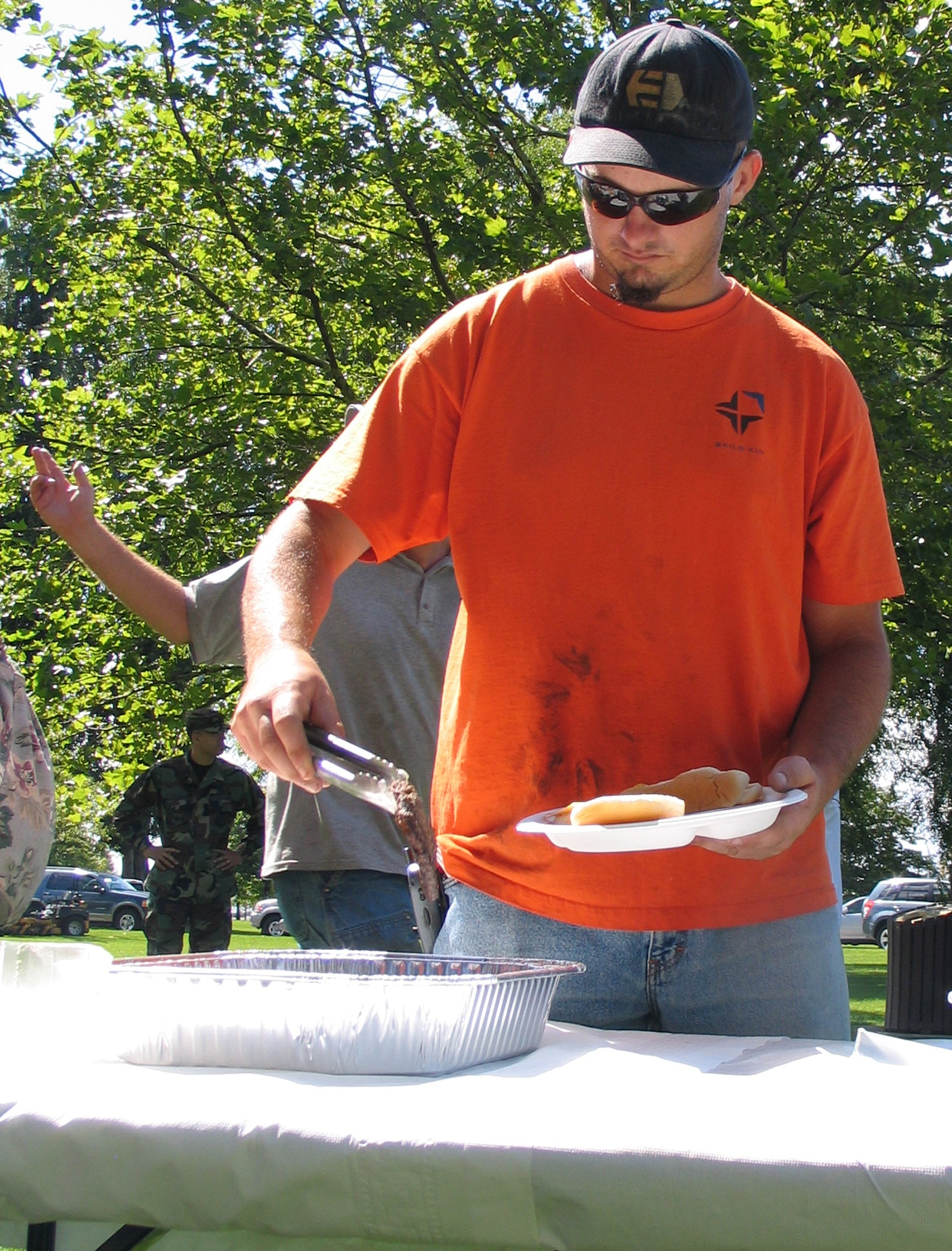 FAIRCHILD AIR FORCE BASE, Wash. – The 92nd Contracting Squadron here hosted a picnic Aug. 22 to thank the many Ability 1 contracted personnel who take care of base grounds keeping, facility cleaning, and other base services. “This is our way of saying ‘Thank you’ to some people who are an important part of Team Fairchild,” said Maj. Fred Lacey, 92nd CONS commander, adding that this was the fifth annual picnic honoring our Ability 1 civilians. (U.S. Air Force photo / Staff Sgt. Connie L. Bias)
