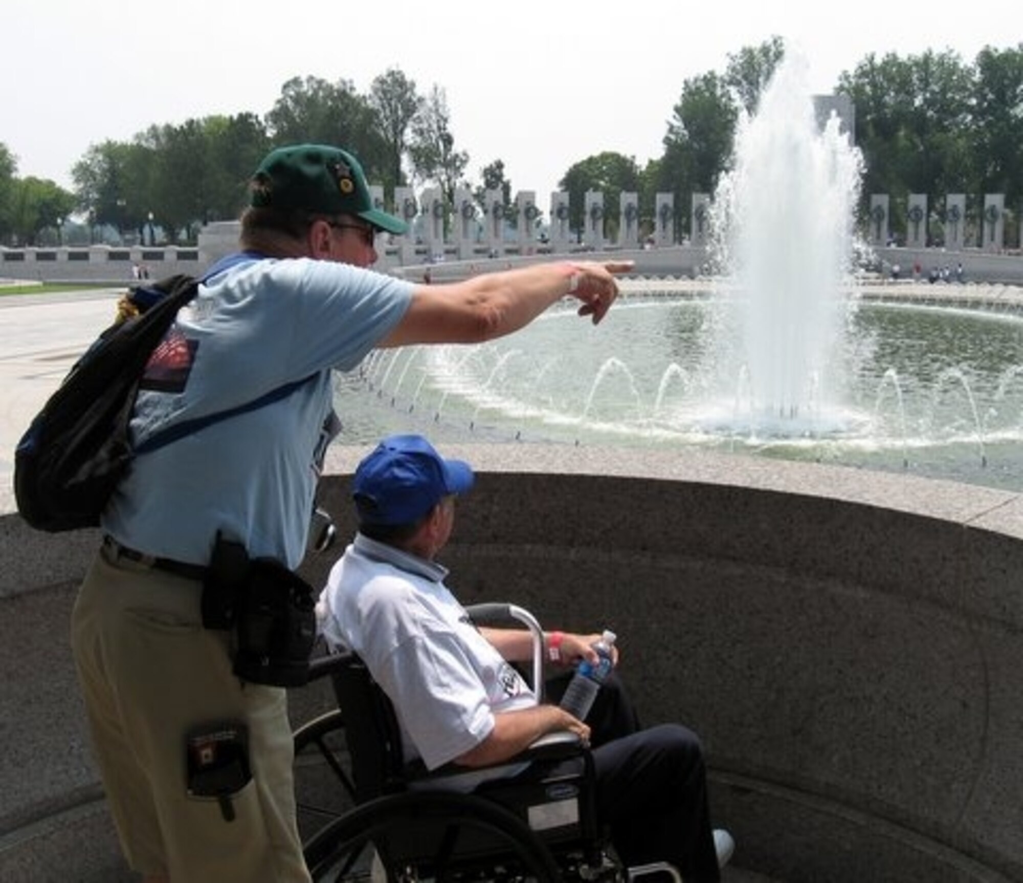 WASHINTONG D.C. -  Jerry Sheldt, left, and his father, WWII veteran Harry Sheldt at the WWII Memorial in Washington D.C.  The two gentlemen participated in a Honor Flight, a flight that brings WWII veterans to the nations capital to view the WWII Memorial in person.  (U.S. Air Force photo/Charlie Miller)