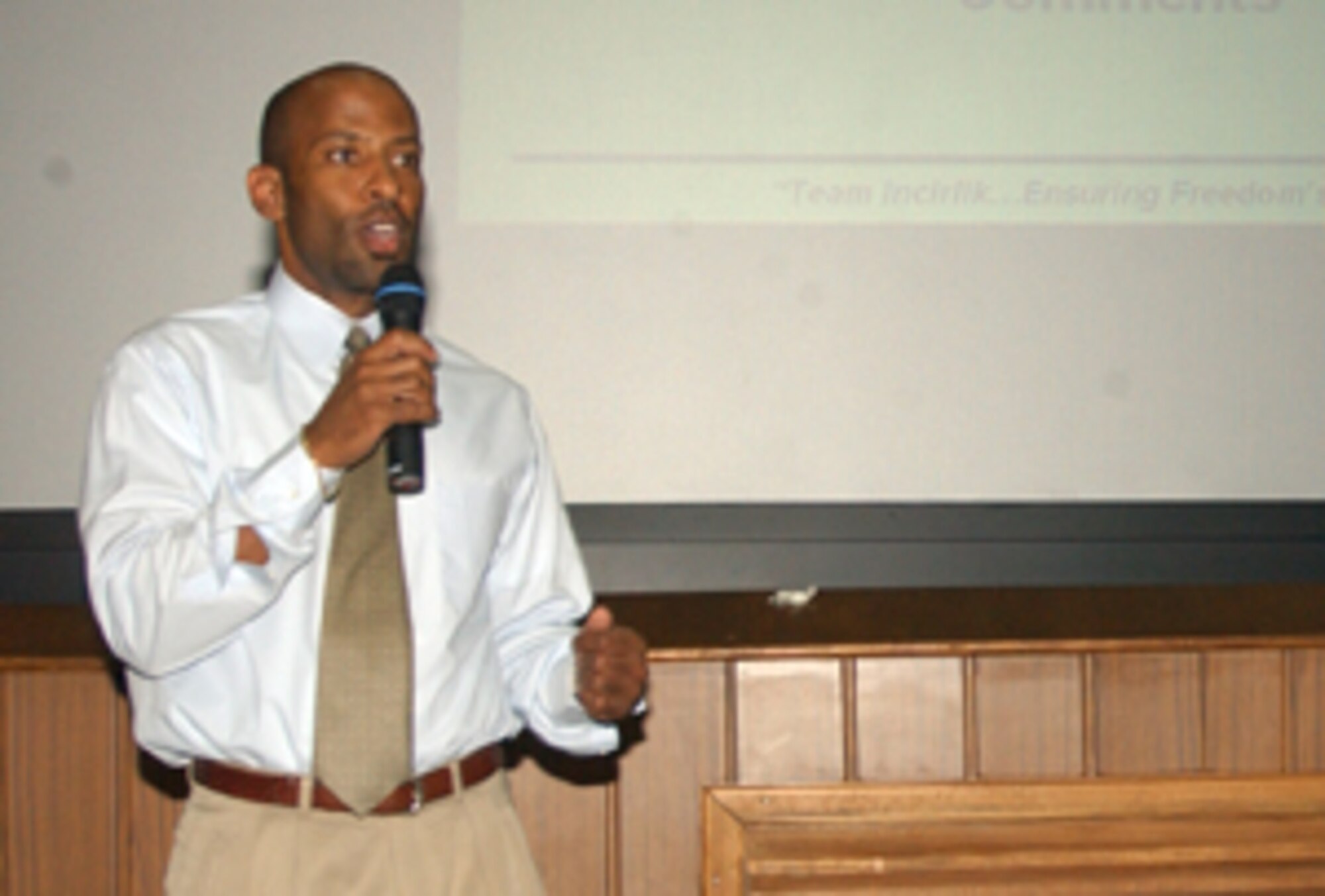 Incirlik's new American School Principal Mr. Raynard Eddings, speaks at the base theater to the community about the up and comming school year Aug. 22. (U.S. Air Force photo by Senior Airman Jason Burton)