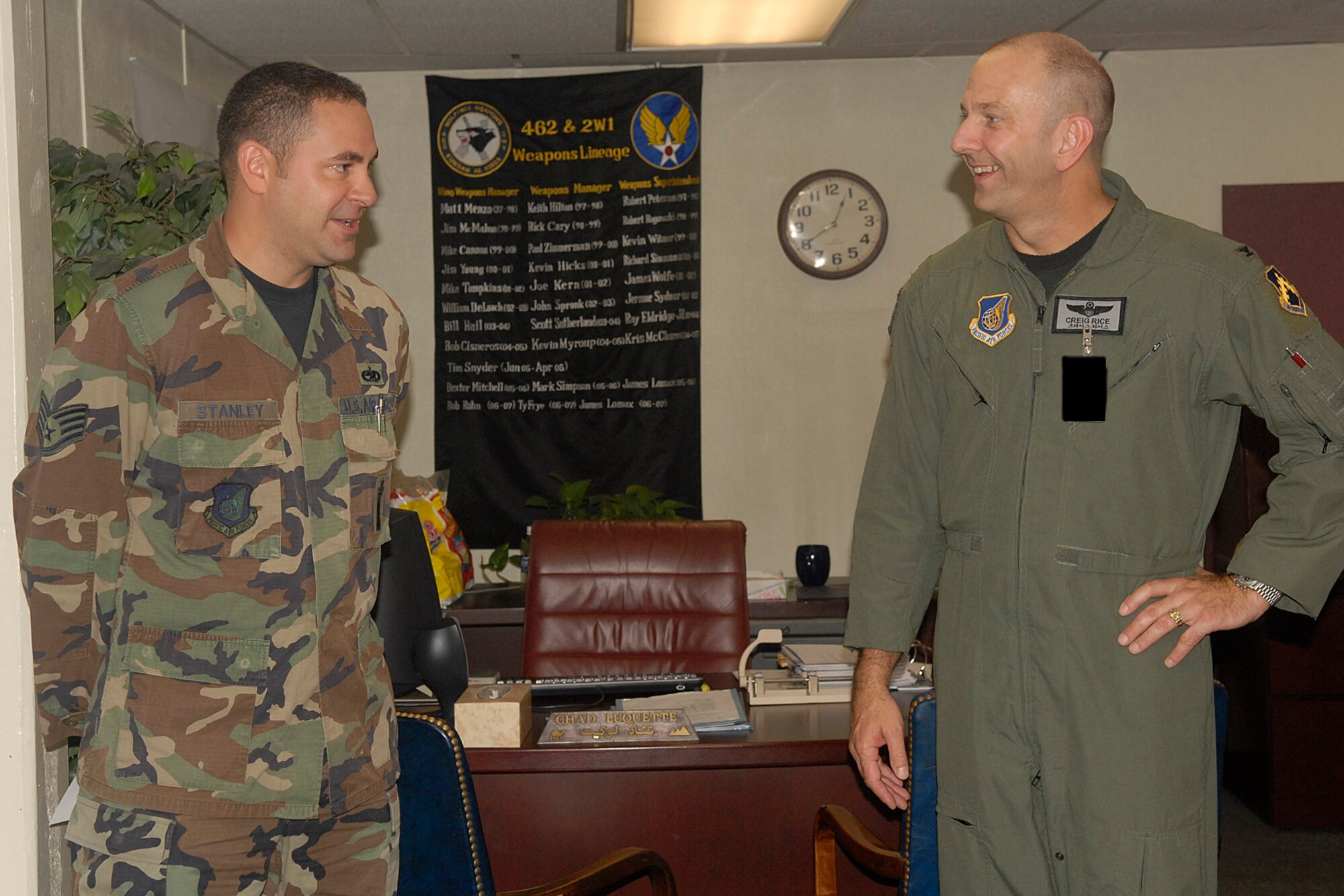 KUNSAN AIR BASE, South Korea -- Colonel Creig "Wolf 2" Rice, 8th Fighter Wing vice commander, talks with Staff Sgt. Jack Stanley, 8th Maintenance Group weapons loade,r here Aug. 16. Sergeant Stanley was recognized as the 8th FW's Pride of the Pack for the week of Aug. 13. (U.S. Air Force photo/Senior Airman Giang Nguyen) 