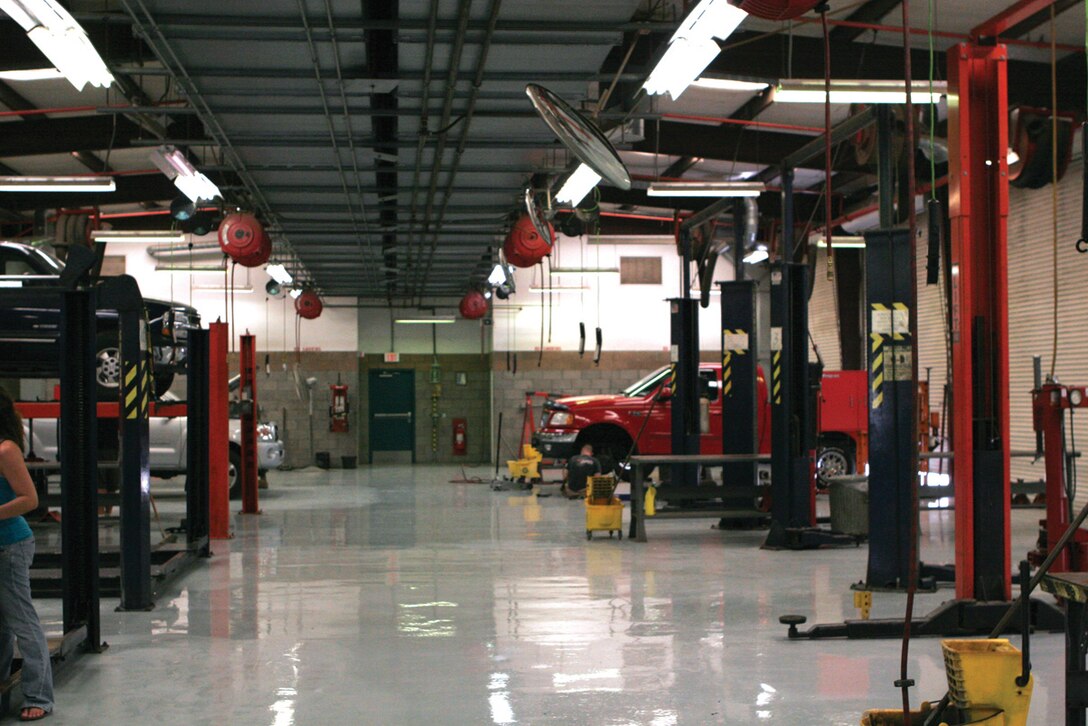 The inside of the station?s Auto Service Center, Building 654, contains 12 service stalls with seven hydraulic lifts, one engine rebuilding room and a welding room that can accommodate vehicles for repair and maintenance needs. Patrons have the option to rent out stalls and work on their own vehicles at the hobby shop.