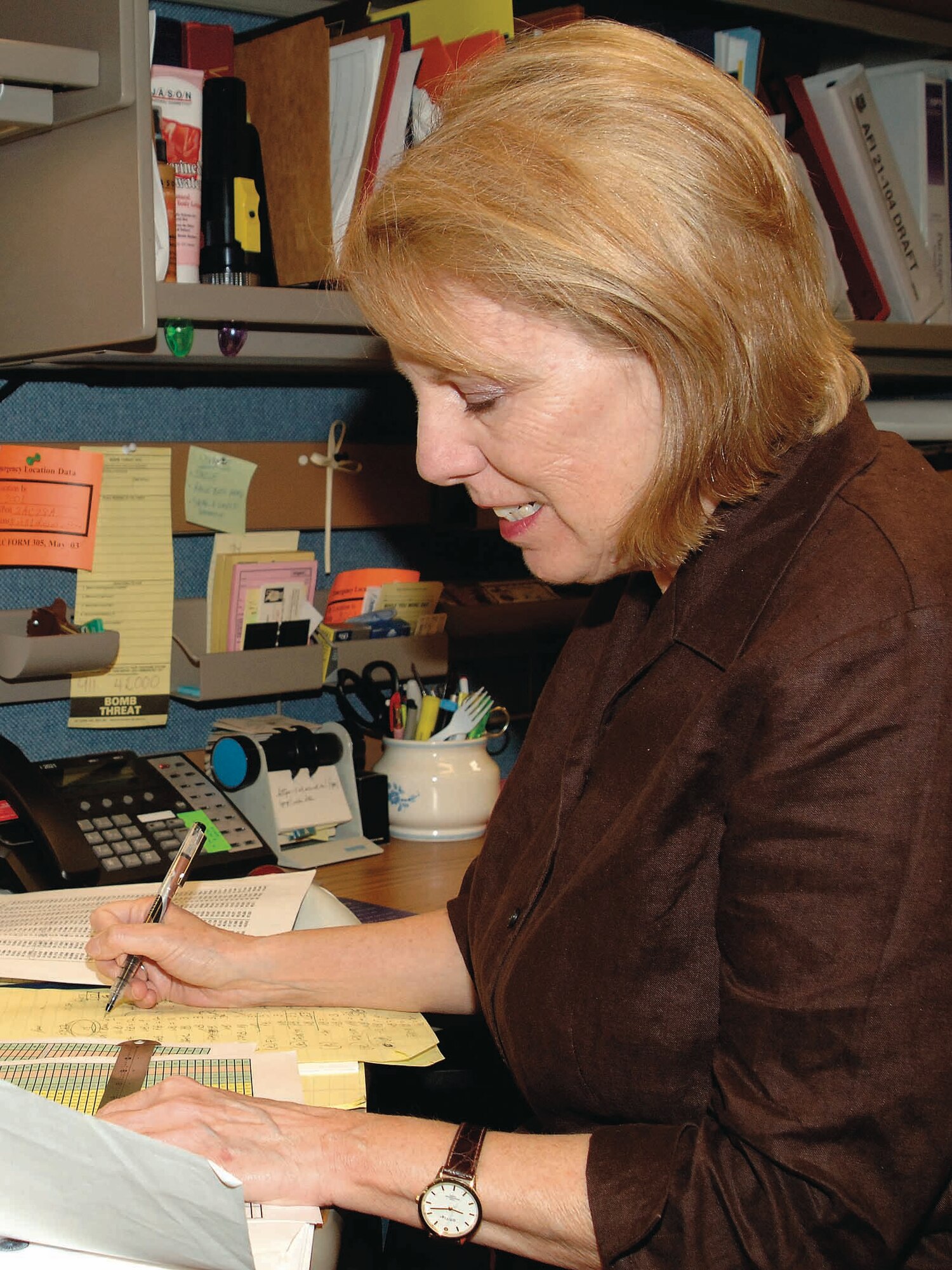 Janice Everhard, analyst, crunches numbers for 2008 spare engine stock levels. (Air Force photo by Kelly Sharp)