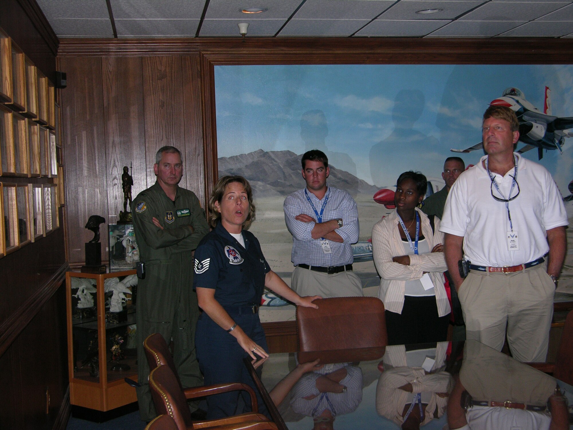 Tech. Sgt. Pam Anderson, member of the Air Force Thunderbirds team, talks about the illustrious history of the aeronautical demonstration team to civic leaders from Goldsboro, N.C.  More than 30 community leaders were able to travel to Nellis Air Force Base with the 916th Air Refueling Wing and 4th Fighter Wing.