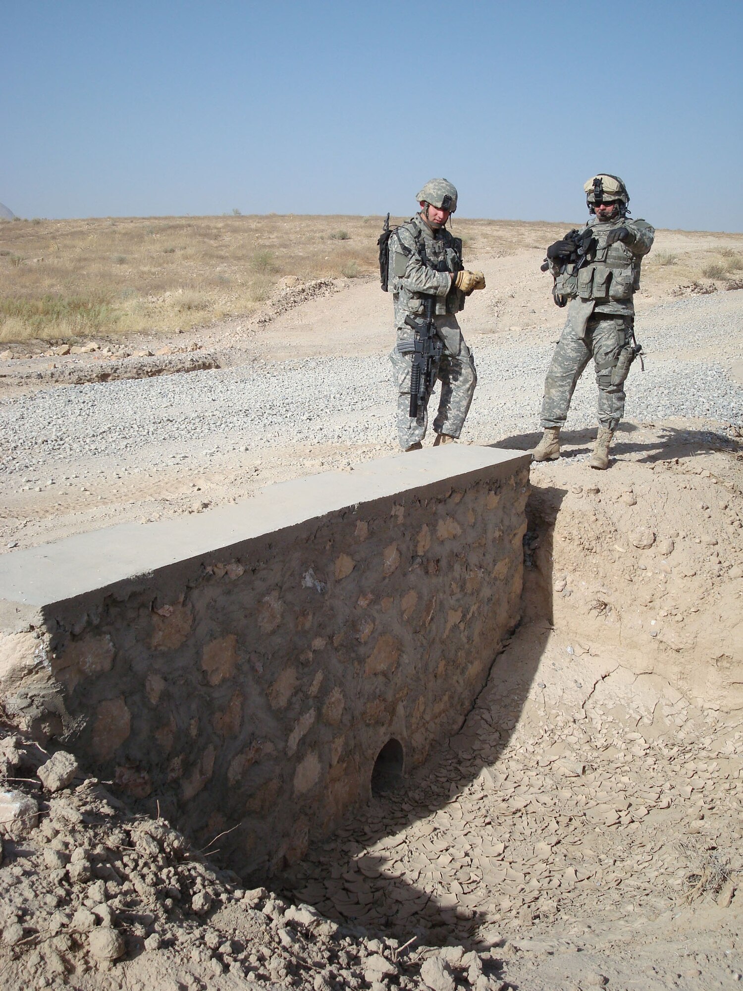 1st Lt. Travis Vazansky, left, deployed from the 341st Civil Engineer Squadron at Malmstrom Air Force Base, Mont., marks waypoints on a GPS during a road assessment with Master Sgt. Paul McIndoe, right, Aug. 18. Both Airmen are assigned to Provincial Reconstruction Team Qalat, Afghanistan. PRT Qalat is a joint U.S. Air Force and Army team assigned to the country’s volatile southeast province of Zabul. As part of NATO’s International Security Assistance Force, PRT Qalat conducts civil-military operations designed to extend the reach and legitimacy of the Islamic Republic of Afghanistan by promoting good governance and justice; enabling an active and effective Afghan security force; and facilitating reconstruction, development and economic growth. Sergeant McIndoe is deployed from the 690th Alterations and Installation Squadron at Lackland Air Force Base, Texas. (U.S. Air Force photo/Capt. Bob Everdeen).