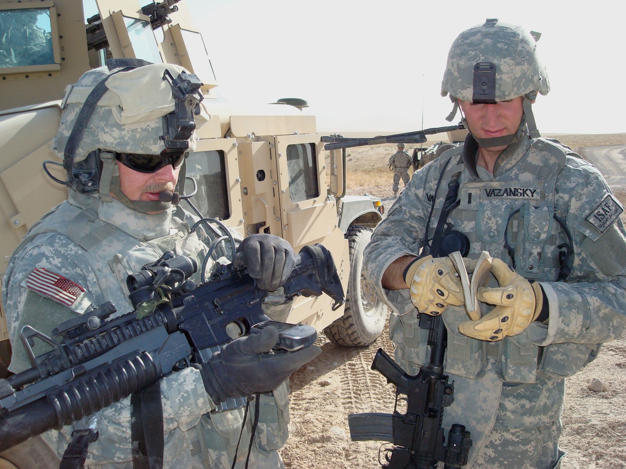 1st Lt. Travis Vazansky, right, deployed from the 341st Civil Engineer Squadron at Malmstrom Air Force Base, Mont., marks waypoints on a GPS during a road assessment with Master Sgt. Paul McIndoe, left, Aug. 18. Both Airmen are assigned to Provincial Reconstruction Team Qalat, Afghanistan. PRT Qalat is a joint U.S. Air Force and Army team assigned to the country’s volatile southeast province of Zabul. As part of NATO’s International Security Assistance Force, PRT Qalat conducts civil-military operations designed to extend the reach and legitimacy of the Islamic Republic of Afghanistan by promoting good governance and justice; enabling an active and effective Afghan security force; and facilitating reconstruction, development and economic growth. Sergeant McIndoe is deployed from the 690th Alterations and Installation Squadron at Lackland Air Force Base, Texas. (U.S. Air Force photo/Capt. Bob Everdeen).