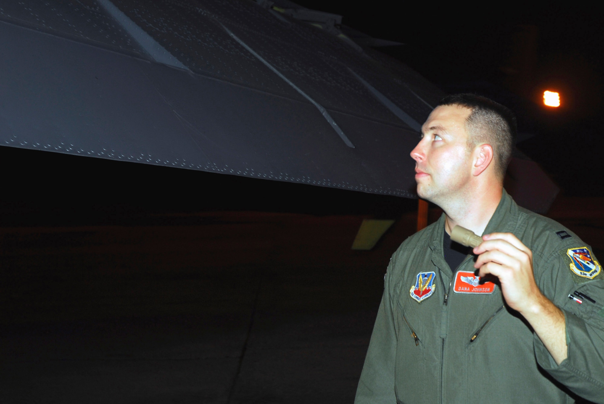 Capt. Dana Johnson conducts a pre-flight inspection of a 2nd Bomb Wing B-52H Stratofortress prior to a maritime intercept training mission, Aug 24. He is an advanced systems project officer assigned to the 49th Test Squadron. (U.S. Air Force photo/Staff Sgt. Mike Andriacco)