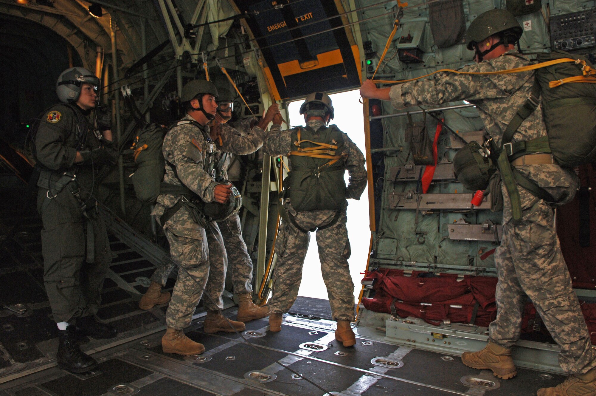 070825 YOKOTA AIR BASE, Japan -- A C-130 Hercules from the 36th Airlift Squadron Yokota Air Base, Japan, fly personnel from the United States Army's 1st Battalion 1st Special Forces Group  to perform a static line parachute jump during the 2007 Yokota Air Base Japanese-American Friendship Festival. Yokota has hosted the Friendship Festival for 57 years, this year an estimated 120,000 guest participated in the festivities.
(U.S. Air Force photo by Senior Airman Veronica Pierce)
