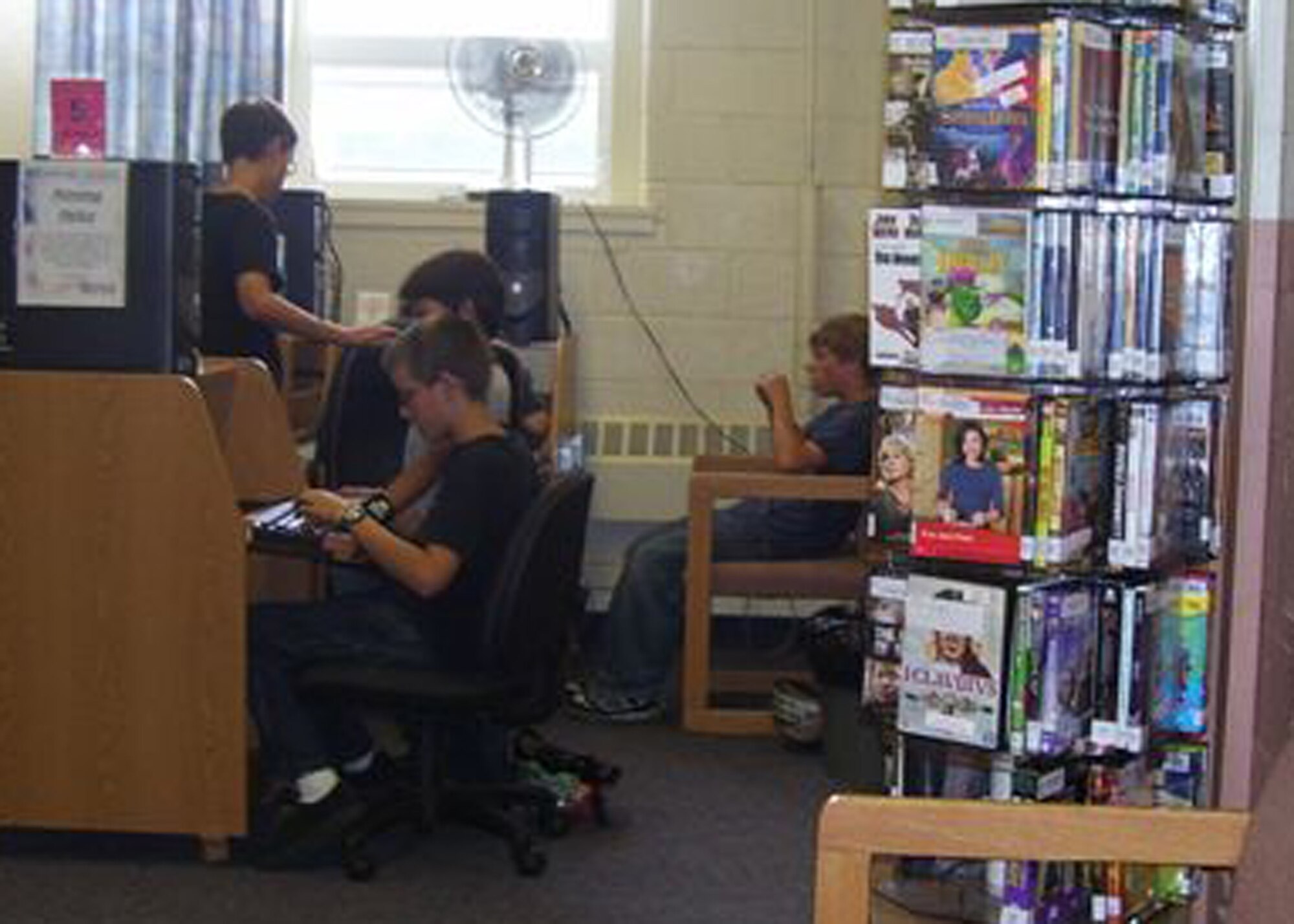 EIELSON AIR FORCE BASE, Alaska--Children use the public access computers at the base library, located next to the Anderson Elementary School. The library has a plethora of resources for Icemen to use for any and all educational purposes such as study guides for CLEP and DANTES testing as well as a youth and young adult room and several special collections of books. (courtesy photo)