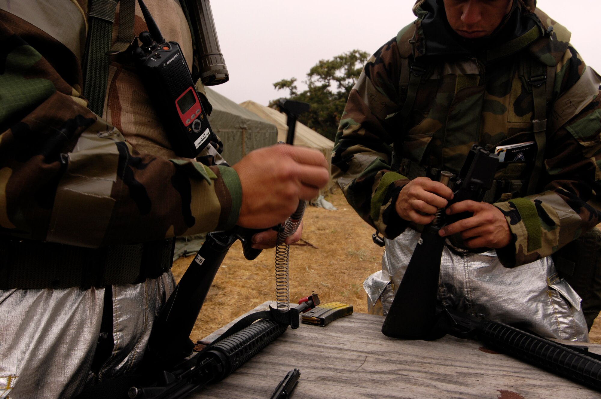 VANDENBERG AIR FORCE BASE, Calif. -- Airmen participating in a North Star exercise learn how to field strip the M-16 rifle on Aug. 23.  (U.S. Air Force photo/Airman 1st Class Christian Thomas)

