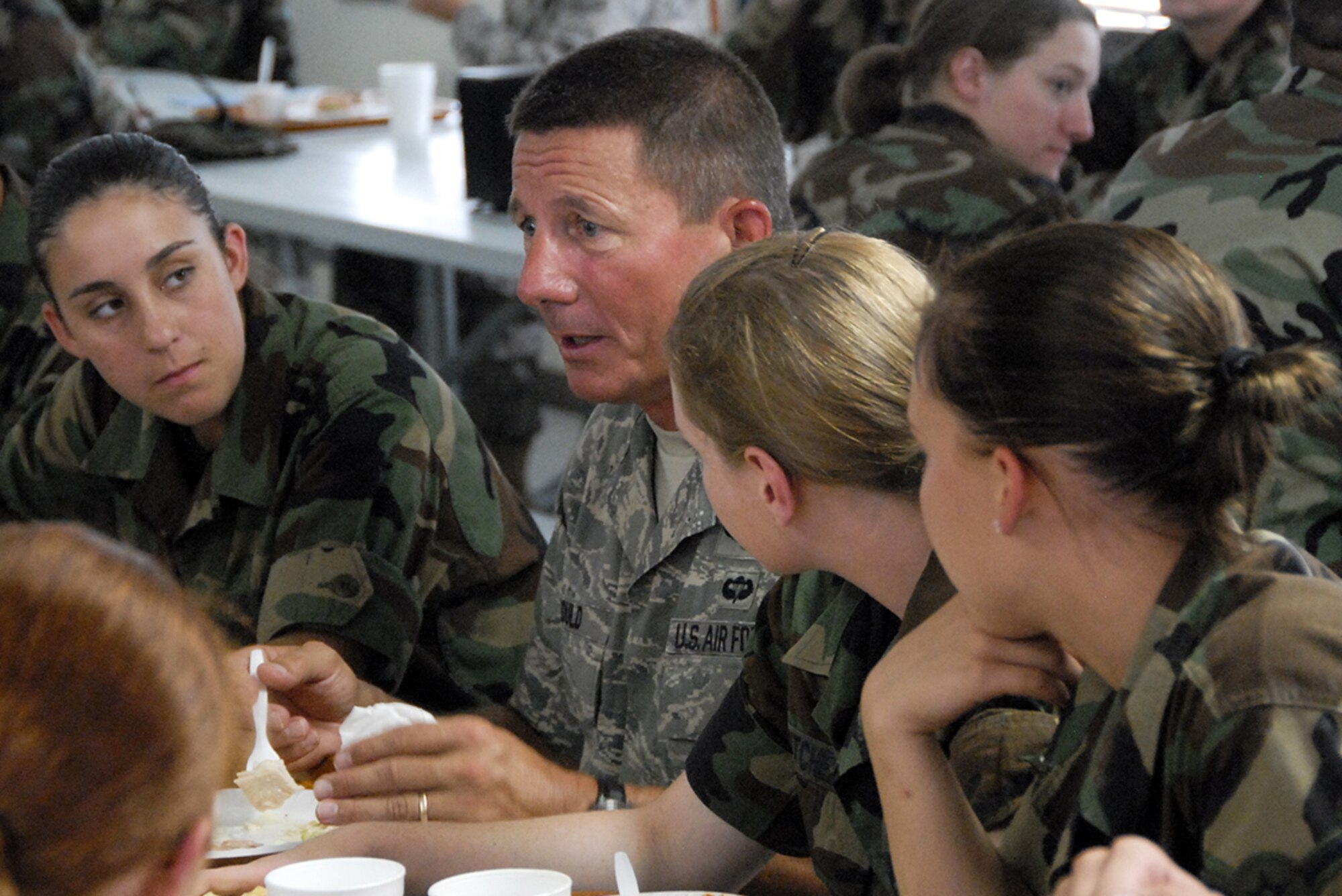Maj. Gen. Michael Gould, 2nd Air Force commander, speaks to a captive audience of 882nd Training Group Airmen in Training as he lunches with them at the medical readiness training site.  The site was one of the general's stops during his tour of Sheppard Aug. 22-26. (U.S. Air Force photo/Harry Tonemah)