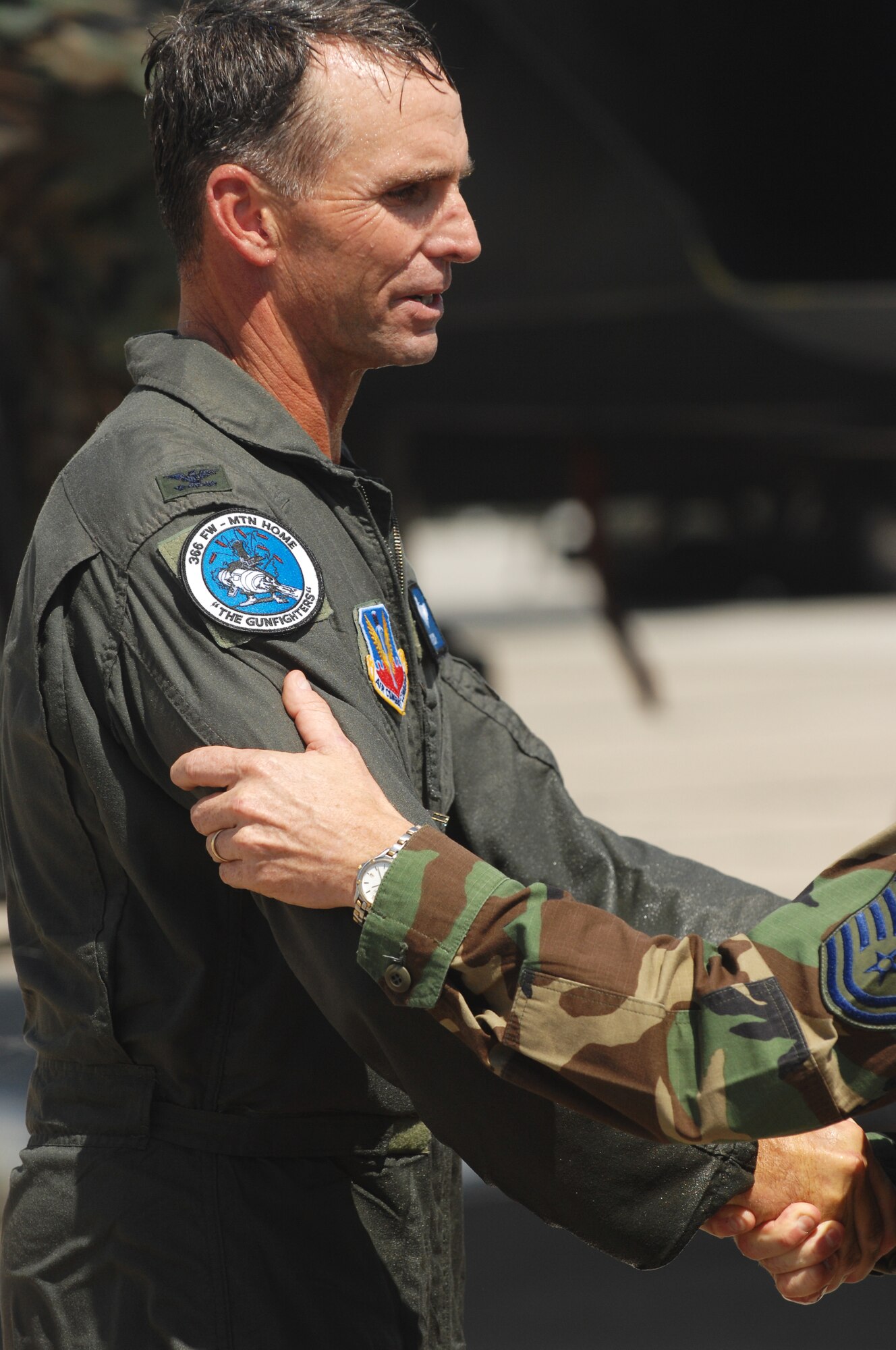 MOUNTAIN HOME AIR FORCE BASE, Idaho -- Col. Tony Rock, the 366th Fighter Wing’s outgoing commander, bids farewell to the Gunfighters after his final flight in the F-15E here Aug. 24. Recently selected to for promotion to brigadier general, Colonel Rock leaves here in September to serve as the deputy director for operations for North American Aerospace Defense Command and U.S. Northern Command at Peterson Air Force Base, Colo. (U.S. Air Force photo/Airman 1st Class Ryan Crane)