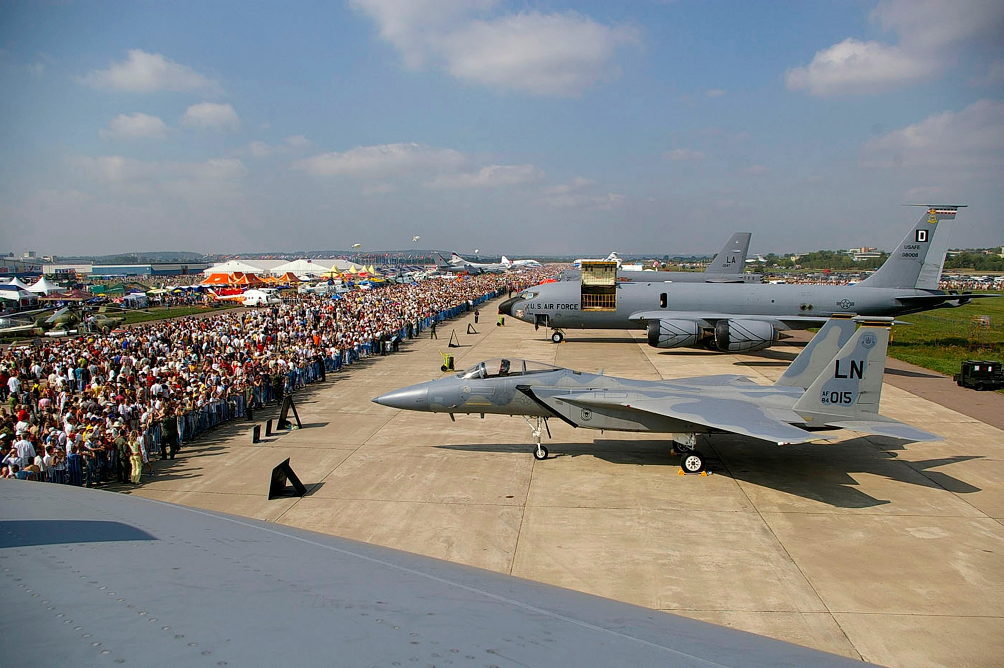 A view from a B-52 Stratofortress cockpit shows just some of the thousands of people who visited the Moscow International Air Show Aug. 25 in Zhukovsky, Russia. A KC-135 Stratotanker from Royal Air Force Mildenhall, England; an F-15 Eagle from RAF Lakenheath, England; a B-52 from Barksdale Air Force Base, La.; a C-17 Globemaster II from McChord AFB, Wash., and two F-16 Fighting Falcons from Spangdahlem Air Base, Germany, were on static display at the air show, along with many other aircraft from all over the world. (U.S. Air Force photo/Karen Abeyasekere)
