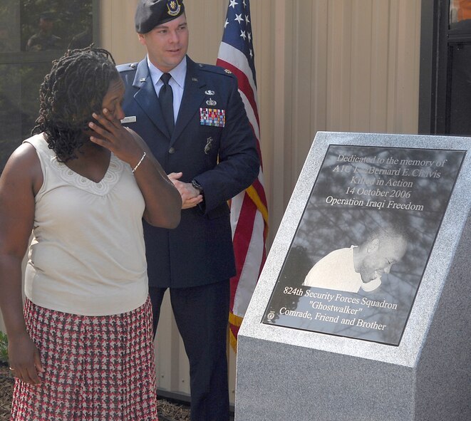 Jackie Chavis, mother of Airman 1st Class LeeBernard Chavis, and Maj. Thomas Miner, former 824th Security Forces Squadron commander, view Airman Chavis' memorial during the Military Operations in Urban Terrain dedication ceremony Aug. 24. Airman Chavis, 824th Security Forces Squadron, was killed in action near Baghdad Oct. 16, 2006, while performing duties as a turret gunner with his security forces’ team on a joint patrol with Iraqi police. (U.S. Air Force photo by Senior Airman Angelita Lawrence)