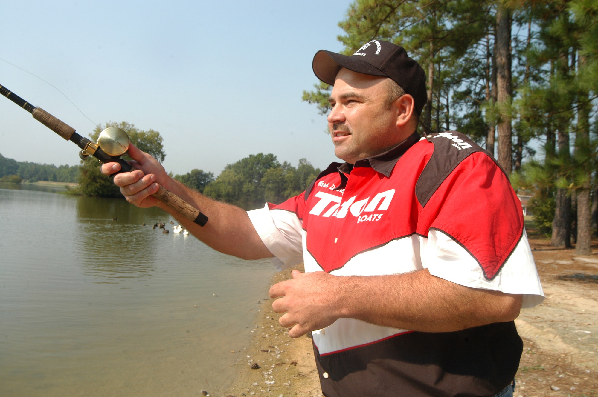 Master Sergeant Mark Denney,  the top-ranked fisherman according to the Georgia power rankings by Georgia Outdoor News Magazine, casts his line into Scout Lake recently. He will be teaching Fishing for Sucess, a free fishing seminar, Sept. 15. (U.S. Air Force photo by SUE SAPP)