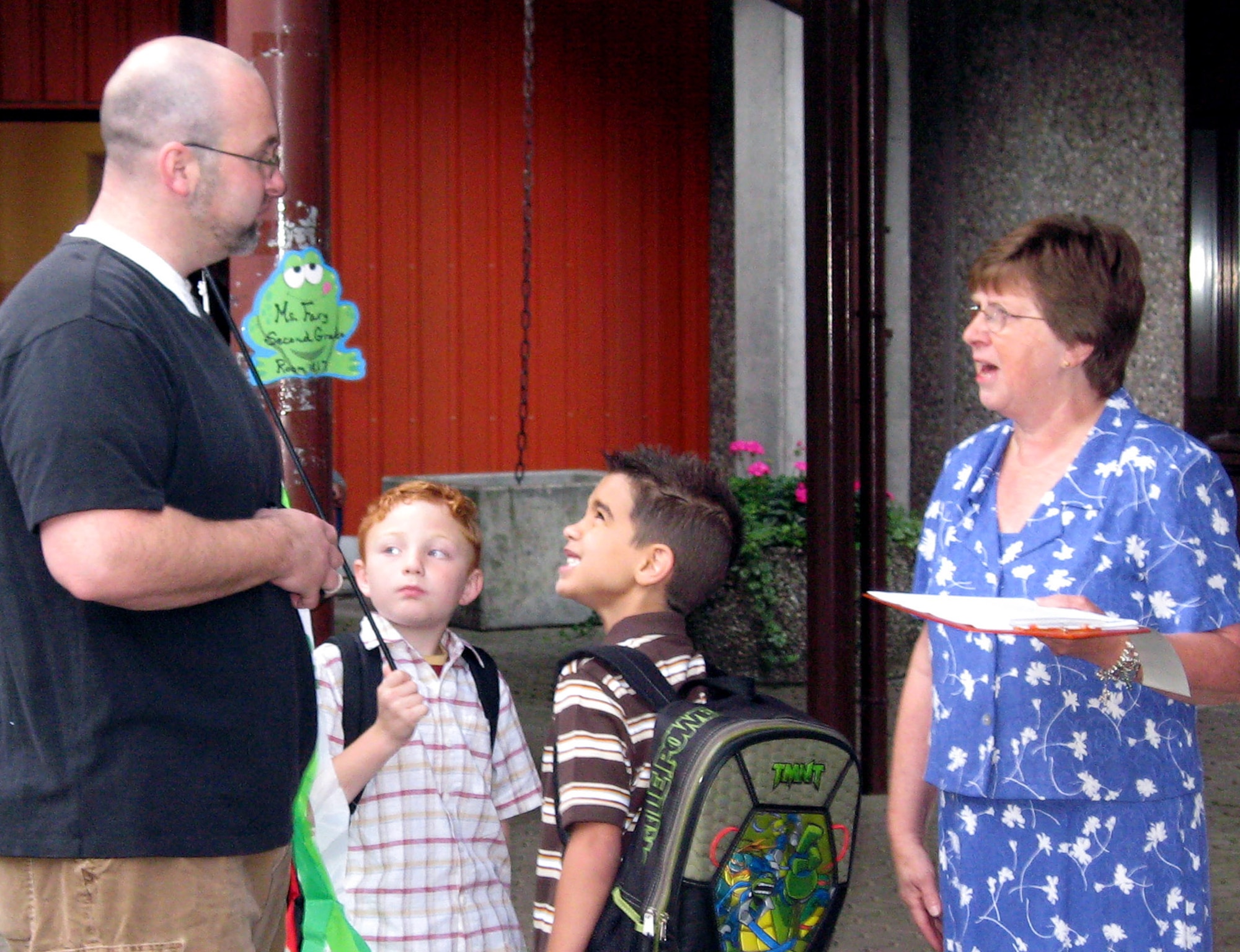 SPANGDAHLEM AIR BASE, Germany – MaryLee Fary, Spangdahlem Elementary School teacher, introduces herself to Jimmy Sloan and his step-son Jordan Franklin-Garza on the first day of second grade Aug. 27. Jordan’s mother is Capt. Judy Sloan from the 52nd Equipment Maintenance Squadron who is currently serving in the area of responsibility. (U.S. Air Force photo/Staff Sgt. Tammie Moore)