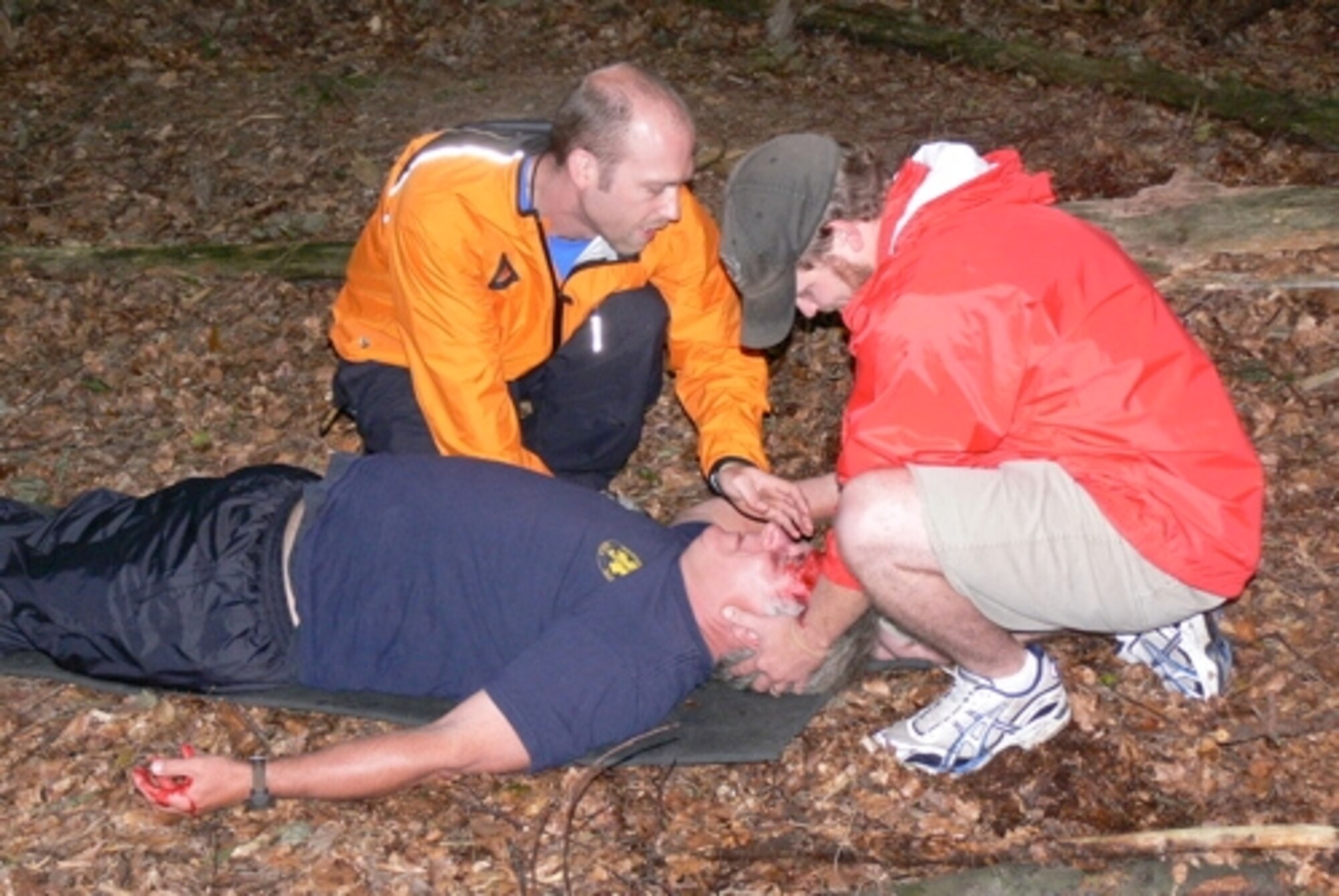 Matt and Jeff Heagerty treat a simulated head injury on Keats McLaughlin during U.S. Air Forces in Europe Services Outdoor Recreation Wildernes First Aid training, August 14 - 16, 2007.  The training, hosted at Spangdahlem Air Base, Germany, enhanced the participants' emergency response skills during outdoor recreation activities. (courtesy photo)