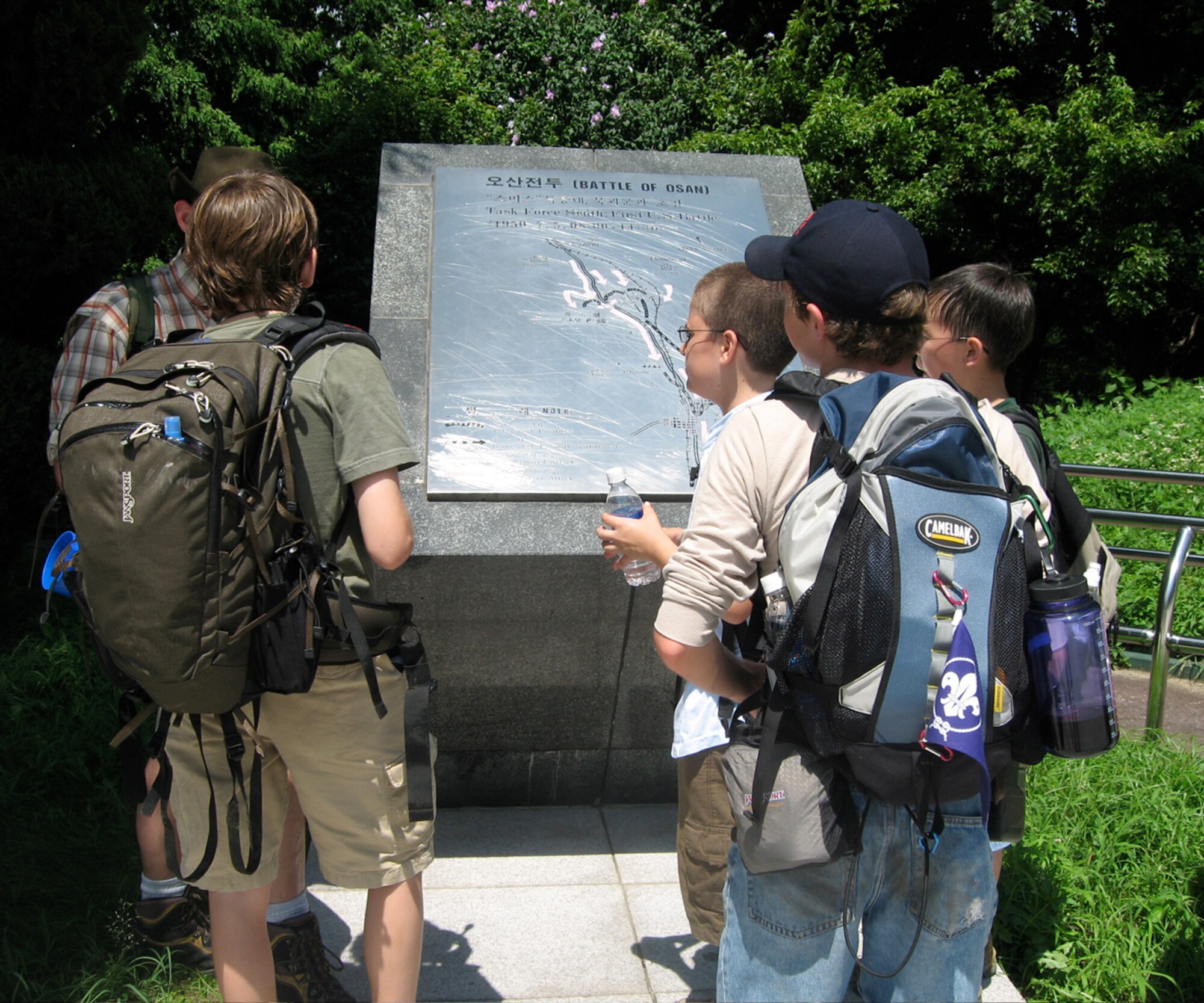 OSAN AIR BASE, Republic of Korea – The Osan chapter of the Boy Scouts took a 10 mile hike on the weekend of 11 August, retracing some of the Task Force Smith trail.  That is the route from Busan to Osan that the first U.S. forces took at the start of the Korean War.  The first U.S. battle was fought just north of Osan city and that is where the boy scouts visited.  (Courtesy Photo)