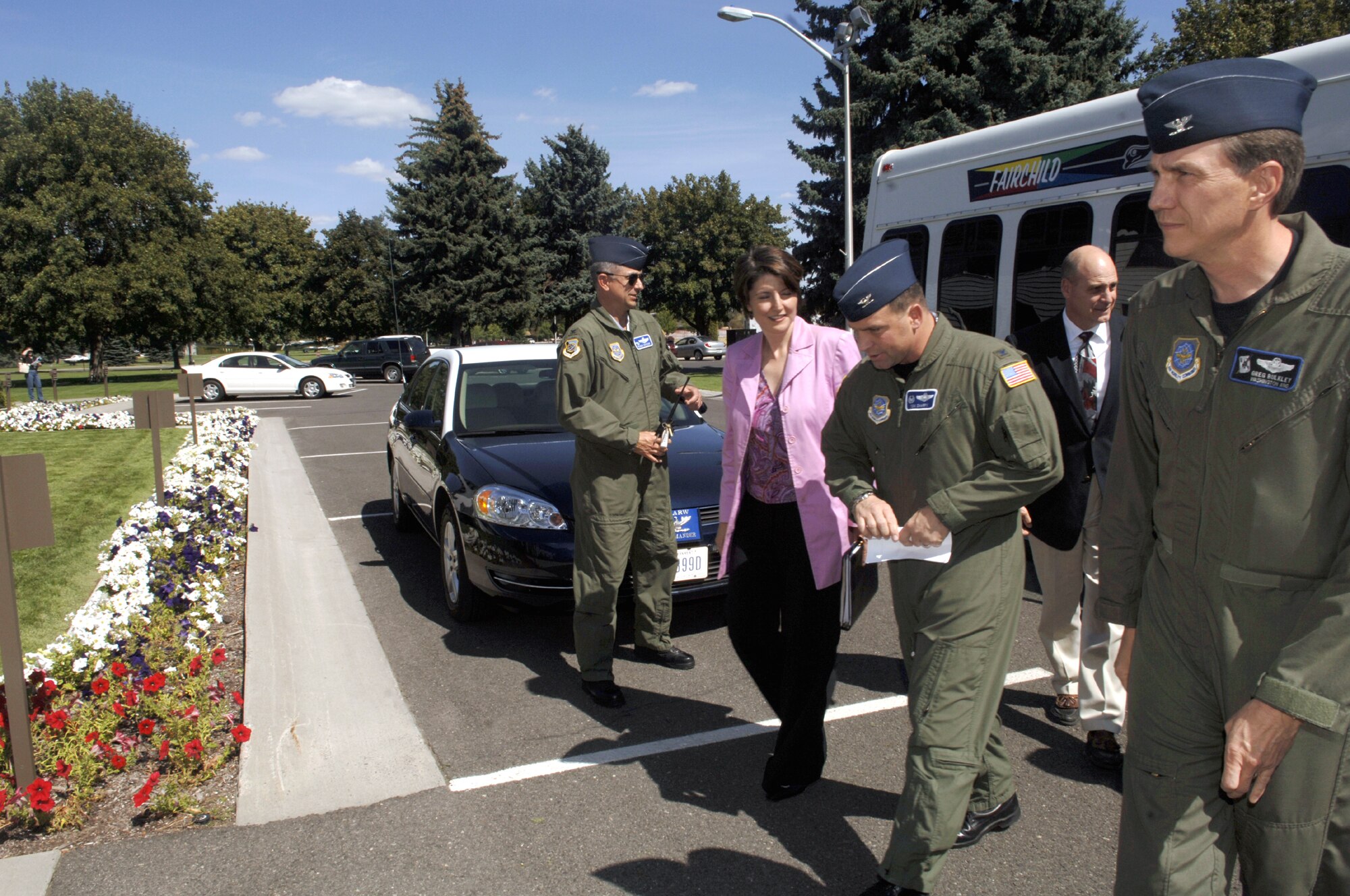 FAIRCHILD AIR FORCE BASE, Wash. – Congresswoman Cathy McMorris Rodgers, center, speaks with Col. Thomas Sharpy, 92nd Air Refueling Wing commander, as she arrives at the White House during a base visit Aug. 24. The congresswoman received informational updates from various base organizations, and spent time listening to Airmen’s deployment stories at the Education Center. (U.S. Air Force photo / Senior Airman Chad Watkins)