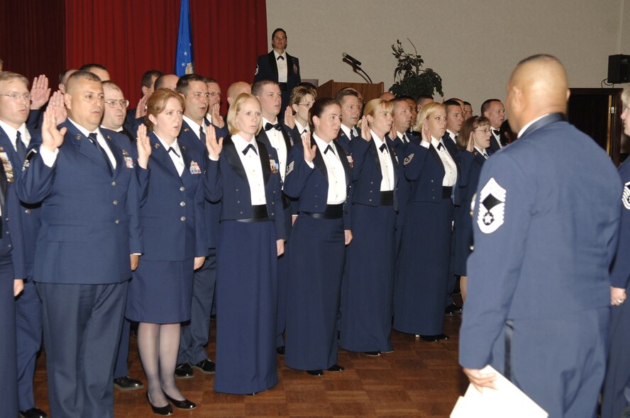 FAIRCHILD AIR FORCE BASE, Wash. – Fifty six Fairchild NCOs swear to uphold the Senior Noncommissioned Officers’ Charge during a SNCO Induction ceremony at Club Fairchild here Aug. 23. The ceremony, which honors and welcomes the base’s newest master sergeants and master sergeant selects, was sponsored by the Fairchild Top Three Association. (U.S. Air Force photo / Airman 1st Class Joshua Chapman)