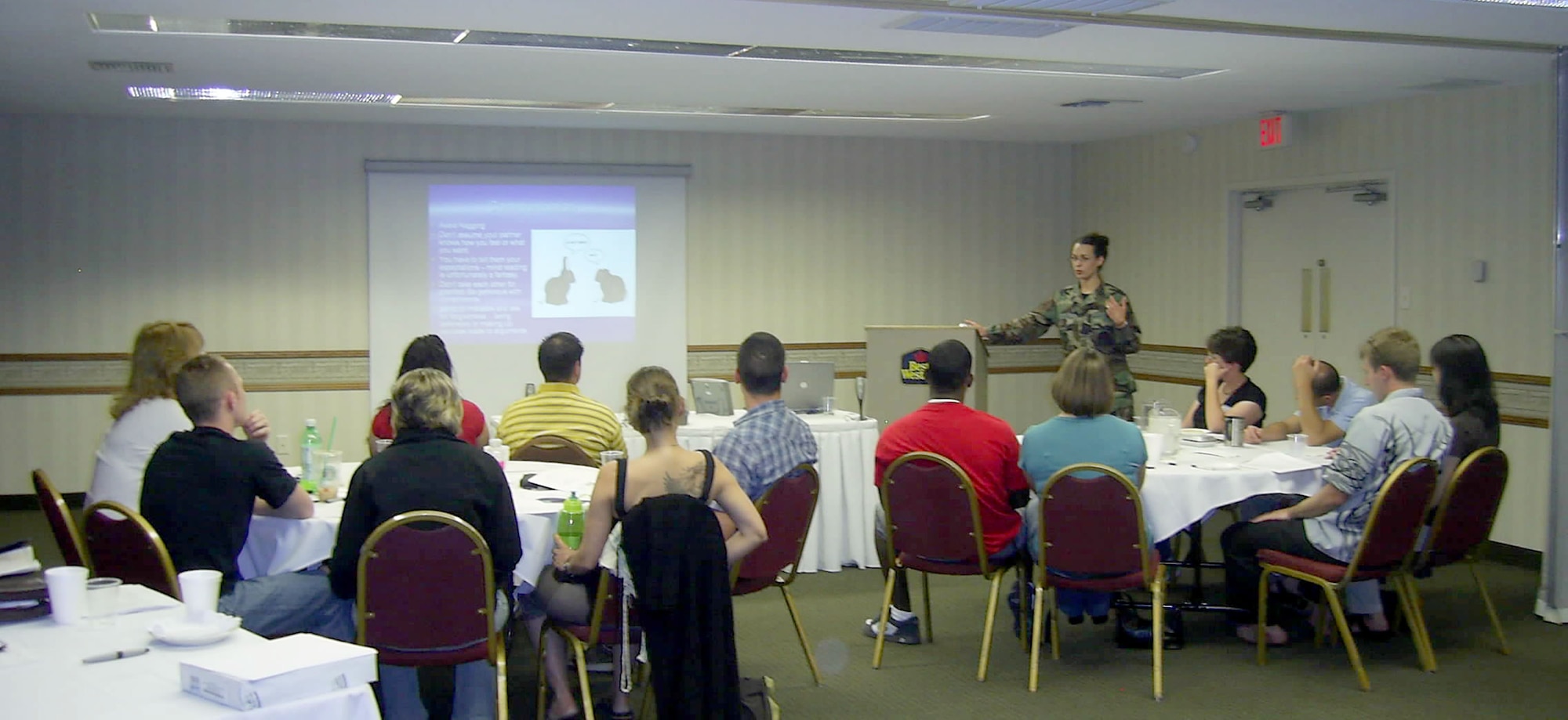 Capt. Laurie Harper, 341st Medical Operations Squadron staff psychologist, talks about managing communication differences between spouses at a free marriage enrichment seminar Aug. 21 to 25 at a local hotel in Great Falls, Mont. The Malmstrom Air Force Base first sergeants, chapel office, Airman and Family Readiness Center and mental health staff coordinated five one-day seminars that  more than 90 members of Team Malmstrom attended. (U.S. Air Force photo/Chaplain (Capt.) Shawn Bishop).