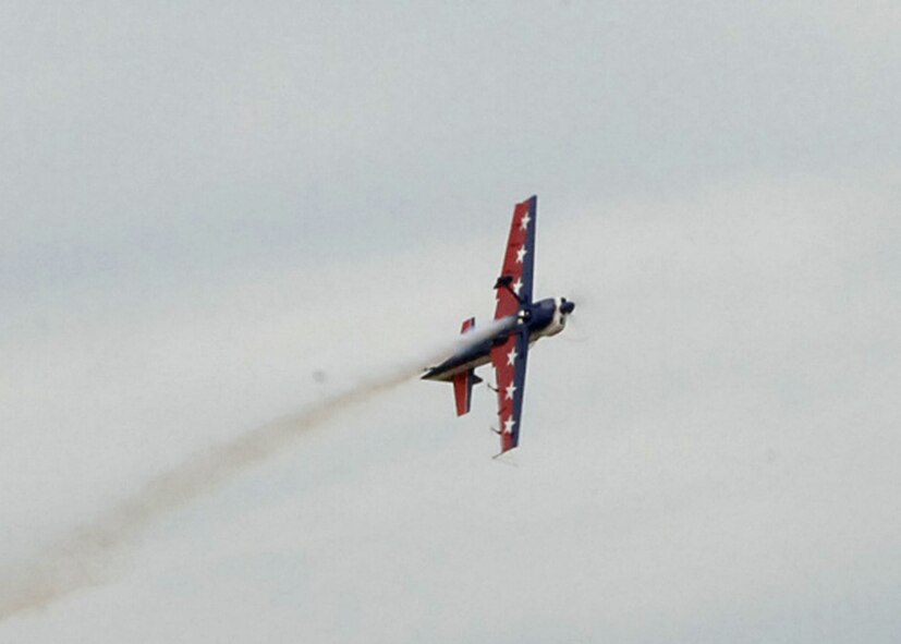 DYESS AIR FORCE BASE, Texas-- Debby Rihn-Harvey demonstrates her flying and maneuvering capabilities at the air show held at Abilene Regional Airport, August 18, 2007. Debby was named highest scoring female competitor for eight years after winning the Betty Skelton "First Lady of Aerobatics" Trophy in 2006. (U.S Air Force photo by Airman 1st Class Felicia Juenke)