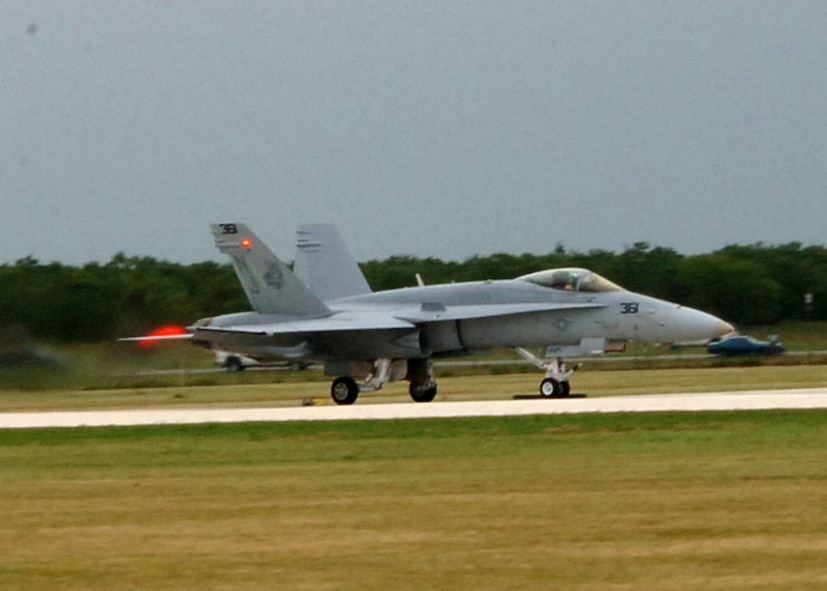 DYESS AIR FORCE BASE, Texas-- F/A 18 pilots, from Lemoore Naval Air Station, CA put on a great performance during the air show held at Abilene Regional Airport, August 18, 2007. The pilots demonstrated many different flying maneuvers and capabilities and came close to breaking the sound barrier.(U.S Air Force photo by Airman 1st Class Felicia Juenke)