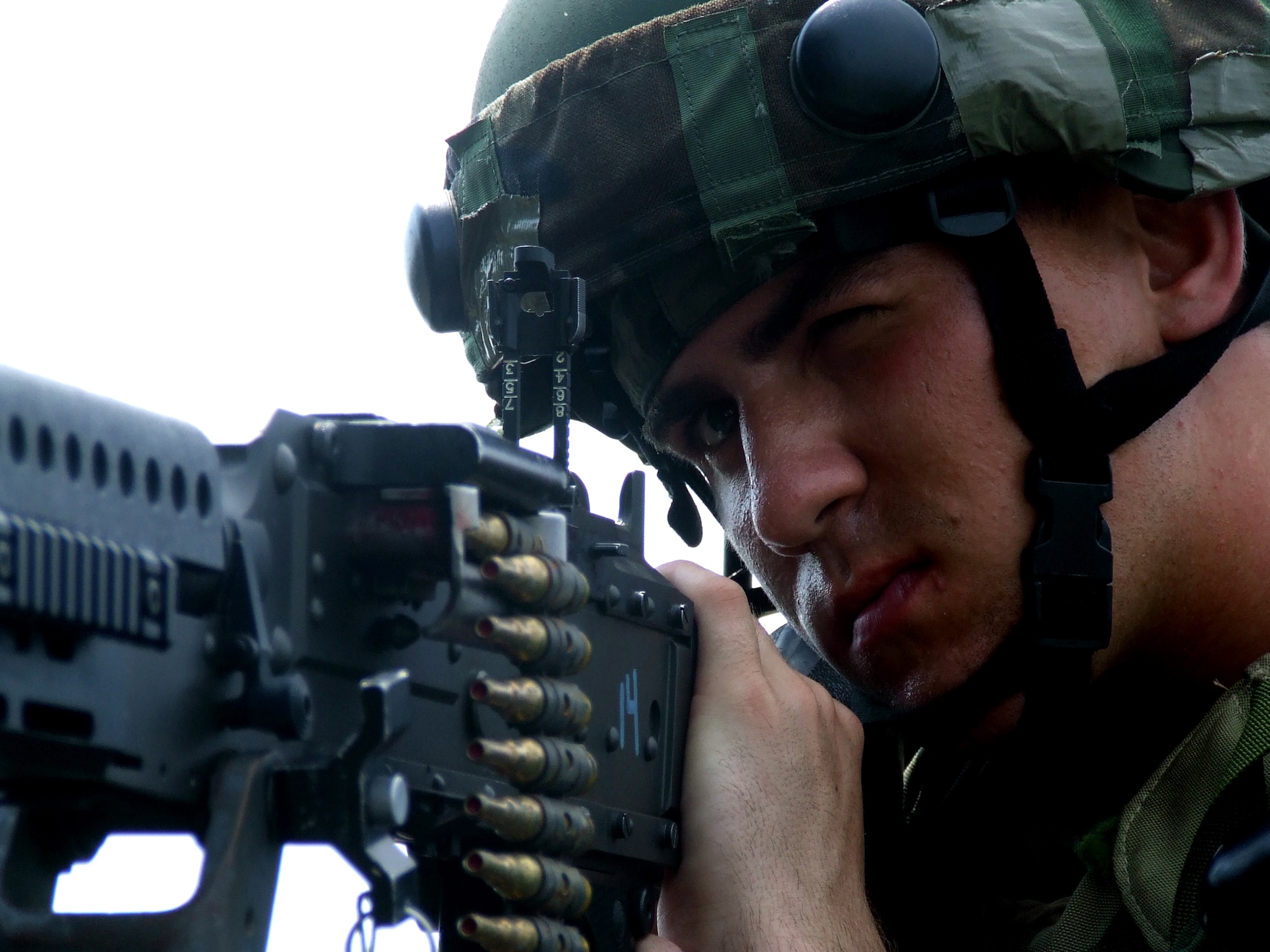 Airman Jeremy Hagen, 305th Security Forces Squadron, McGuire Air Force Base, N.J., watches over a checkpoint for the contingency response group camp during operations for Air Force Exercise Eagle Flag 07-6 at Naval Air Engineering Lakehurst, N.J.  Airman Hagen deployed to Eagle Flag with the 816th Contingency Response Group, also from McGuire. The exercise is operated by the U.S. Air Force Expeditionary Center's 421st Combat Training Squadron at Fort Dix, N.J.  (U.S. Air Force Photo/Tech. Sgt. Scott T. Sturkol)