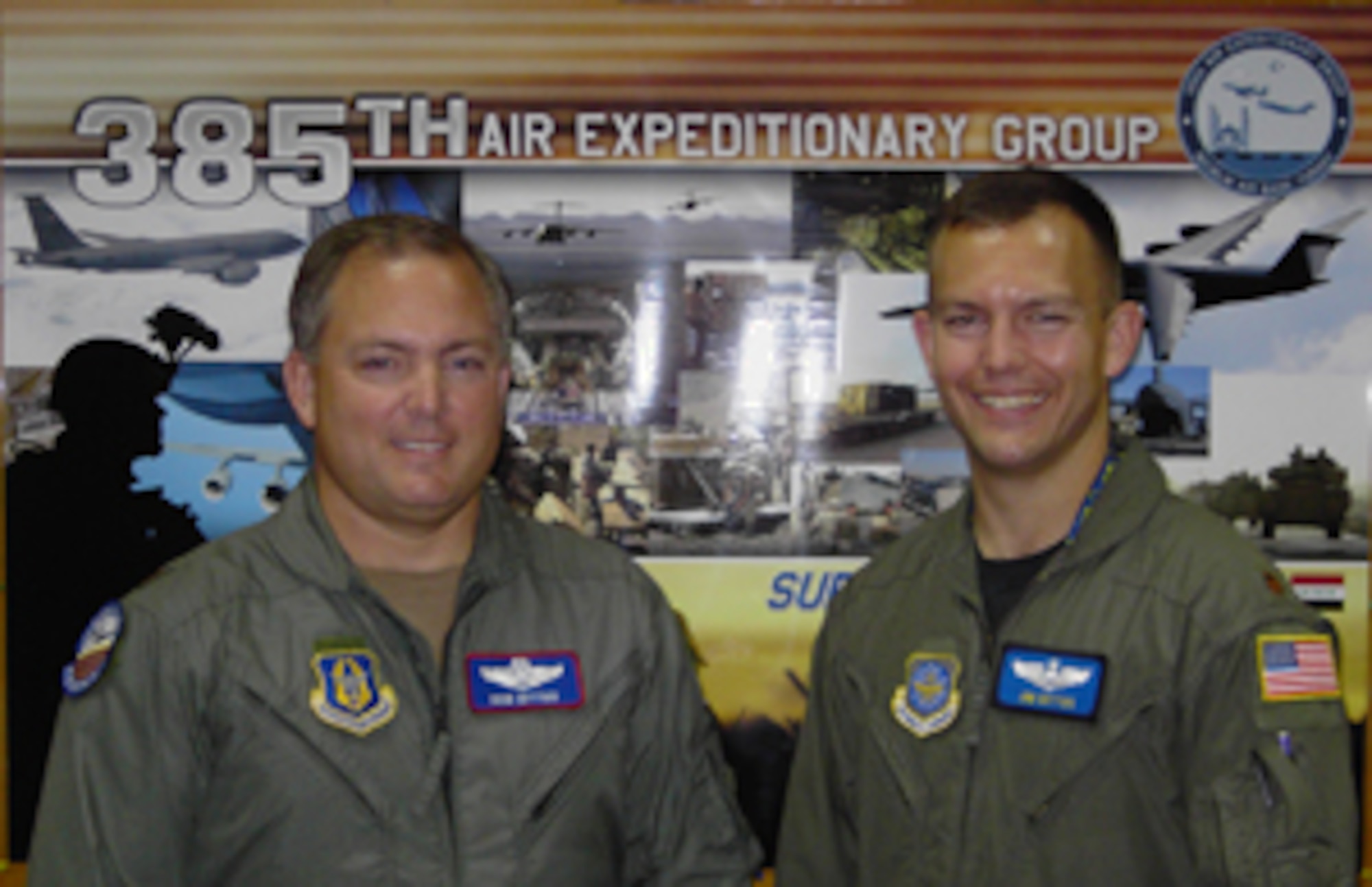 Majors Bob and Jim Dittus, brothers assigned to the 385th Air Expeditionary Group, met up at incirlik Air  Base Aug. 17. Major B. Dittus flies for the 22nd Expeditionary Air Refueling Squadron and Major J. Dittus flies for the 817th Expeditionary Airlift Squadron. (U.S. Air Force photo by Captain Rose Richeson)