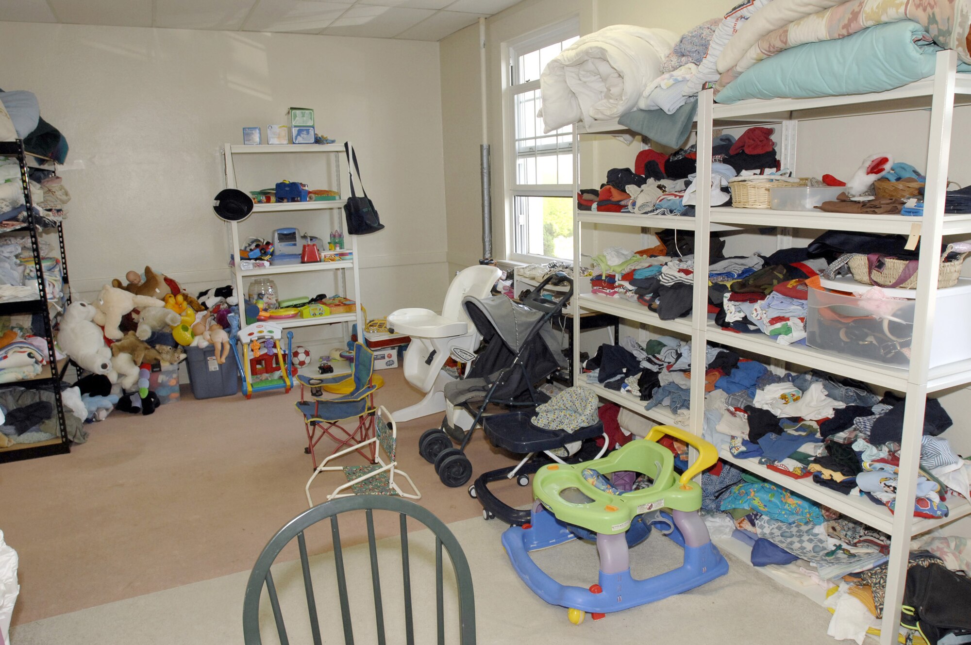 Baby clothes and other items are available at the Airman’s Attic. (Photo by Lou Hernandez)
