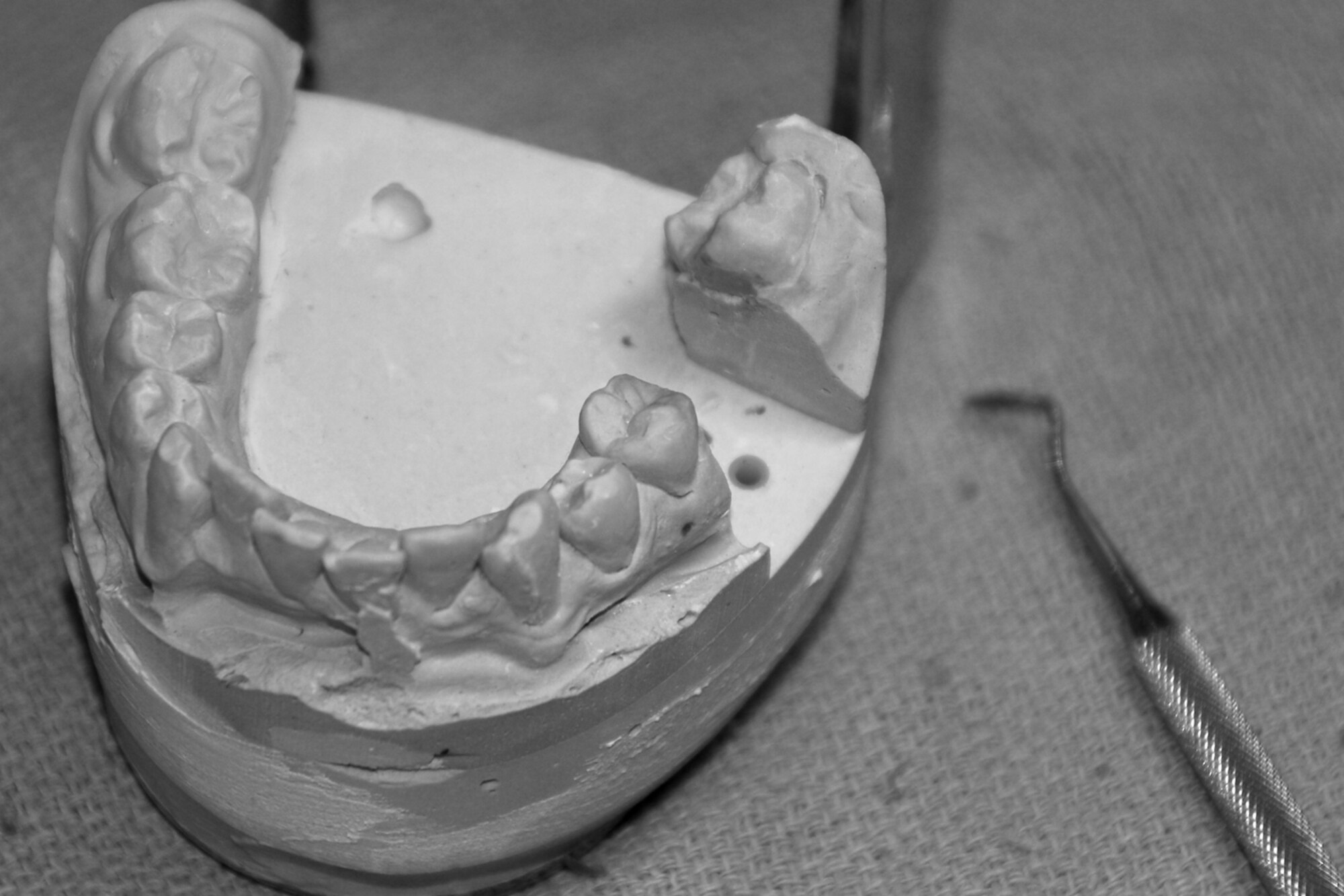 OSAN AIR BASE, Republic of Korea -- Dental instruments are prepared for use by dental personnel here on Aug. 24. The 51st Dental Squadron perform numerous tasks to keep the Mustang Stampede smiling. (U.S. Air Force photo by Airman 1st Class Chad Strohmeyer)(Released)