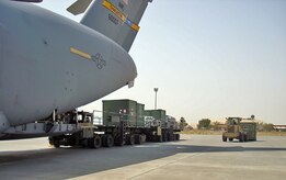 A C-17 crew from the 14th Airlift Squadron delivers passengers, equipment and supplies to Southwest Asia Aug. 1.  This mission provided support for the arrival of members from the Vermont Air National Guard's 158th Fighter Wing, "The Green Mountain Boys," in a deployed location in Southwest Asia. (U.S. Air Force photo/Capt. William Brown)                     