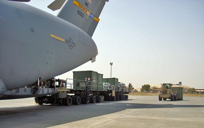 A C-17 crew from the 14th Airlift Squadron delivers passengers, equipment and supplies to Southwest Asia Aug. 1.  This mission provided support for the arrival of members from the Vermont Air National Guard's 158th Fighter Wing, "The Green Mountain Boys," in a deployed location in Southwest Asia. (U.S. Air Force photo/Capt. William Brown)                     