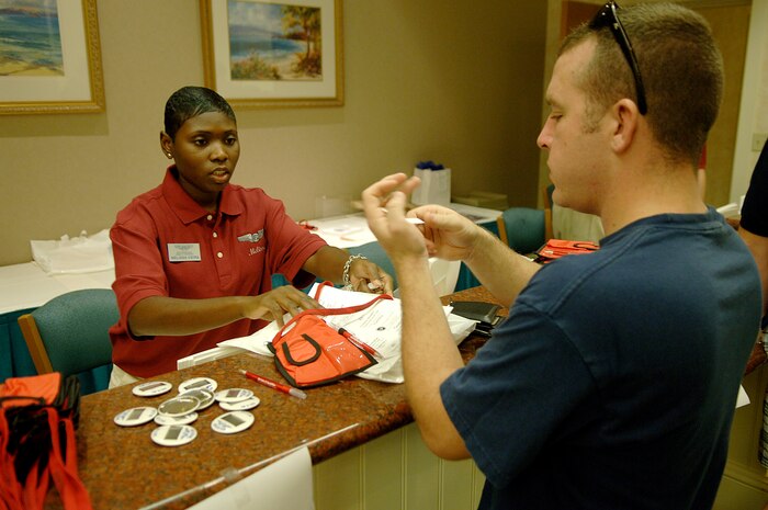 Senior Airman Will Perry, 437th Airlift Wing Protocol, protocol specialist, registers for the 2007 Air Force Sergeants Association Conference held in Orlando, Fla., Aug. 18. (U.S. Air Force photo/ Airman 1st Class Nicholas Pilch)