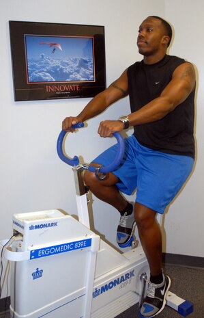 Staff Sgt. Curtis Brown, 437th Aerospace Medical-dental Squadron public health technician, takes the cycle ergometry test at the Health and Wellness Center Wednesday.  The ergo bike is used for members who are unable to do the one-and-a-half mile run for the physical fitness test. (U.S. Air Force photo/Airman Melissa White)