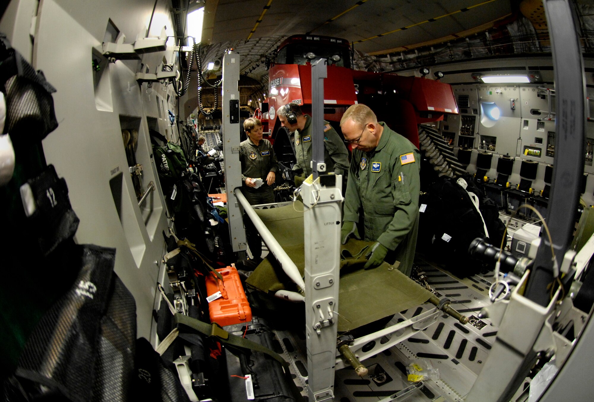 A medical team sets up their equipment on a C-17 Globemaster III before taking off from Christchurch, New Zealand on a medical evacuation mission to Antarctica Aug. 28, 2007. The Airmen are from the 446th Aeromedical Evacuation Squadron, McChord Air Force Base, Wash. The medevac mission is being flown for a patient that requires more definitive medical treatment then can be handled in Antarctica. (U.S. Air Force photo/Tech. Sgt. Shane A. Cuomo)