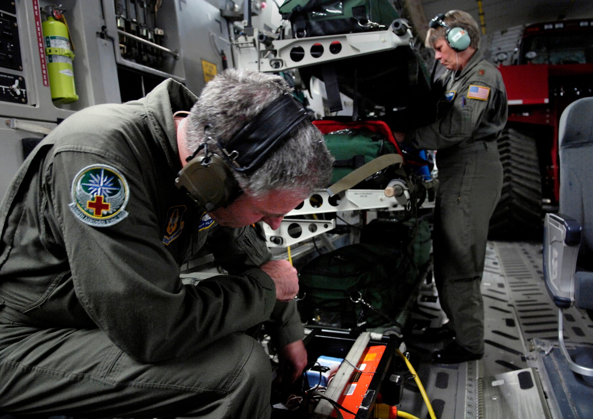 Master Sgt. Howard Halter and Maj. Judy Krill ops check medical equipment on a C-17 Globemaster III before taking off from Christchurch, New Zealand on a medical evacuation mission to Antarctic Aug. 28, 2007. The Airmen are from the 446th Aeromedical Evacuation Squadron, McChord Air Force Base, Wash. The medevac mission is being flown for a patient that requires more definitive medical treatment then can be handled in Antarctica. (U.S. Air Force photo/Tech. Sgt. Shane A. Cuomo)