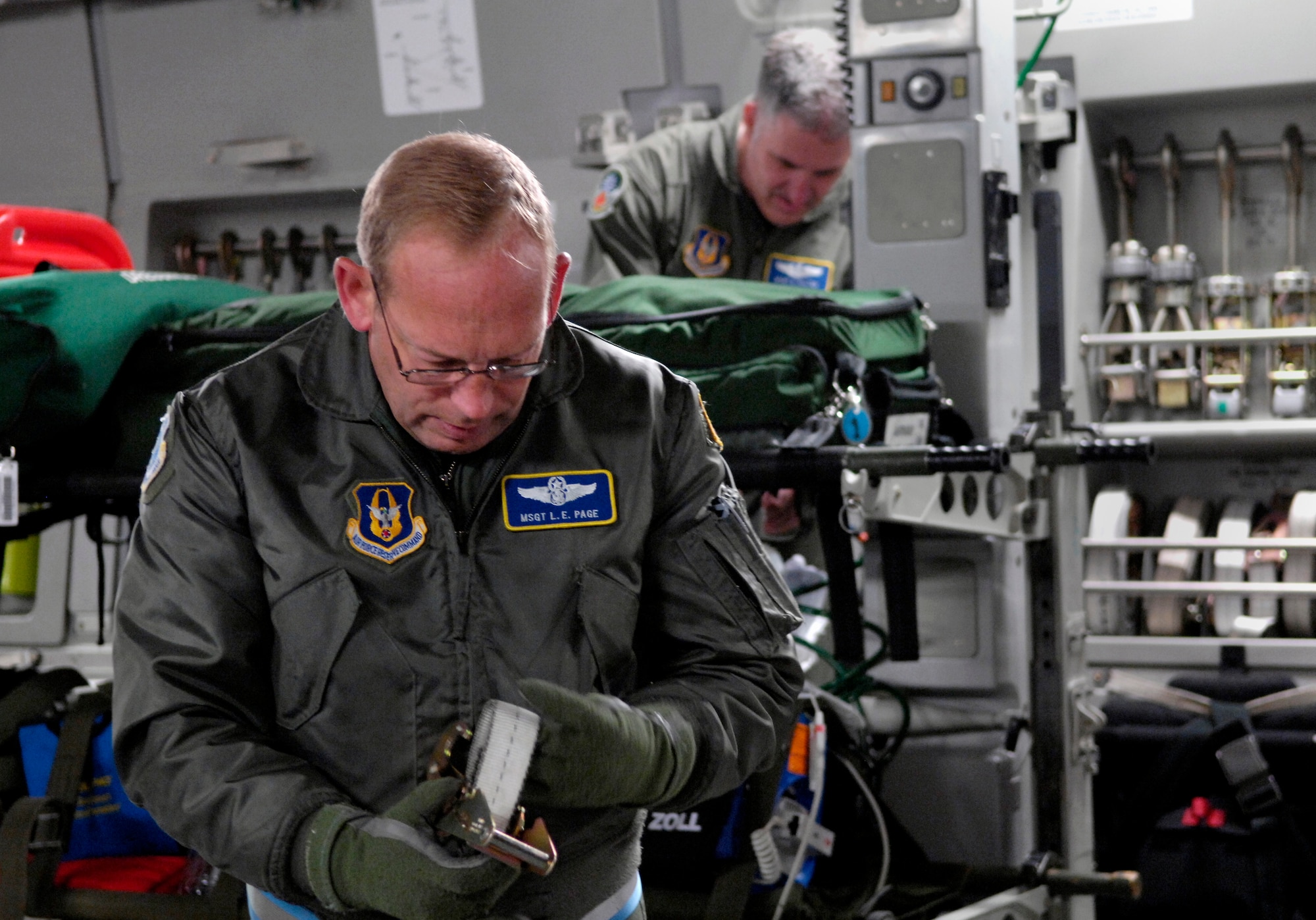 Master Sgt. Lawrence Page and Master Sgt. Howard Halter set up medical equipment on a C-17 Globemaster III before taking off from Christchurch, New Zealand on a medical evacuation mission to Antarctic Aug. 28, 2007. The Airmen are from the 446th Aeromedical Evacuation Squadron, McChord Air Force Base, Wash. The medevac mission is being flown for a patient that requires more definitive medical treatment then can be handled in Antarctica. (U.S. Air Force photo/Tech. Sgt. Shane A. Cuomo)