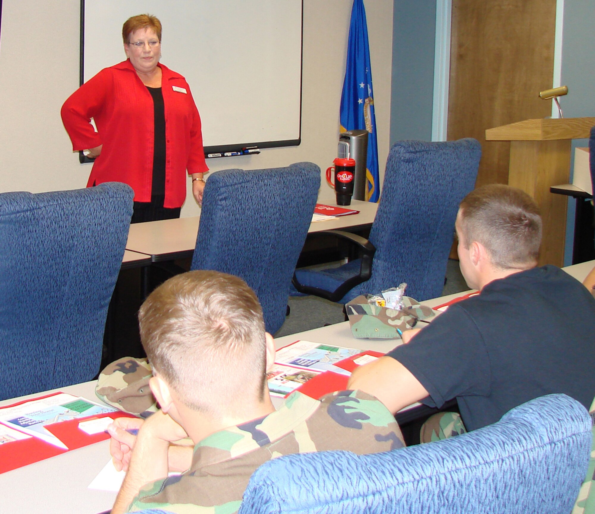 Linda Brezina, assistant vice president, Retail Services – Mortgage Lending at Central National Bank of Enid, speaks to first-time homebuyers about loans during the Homebuyers Workshop Aug. 22 at the Vance Airman & Family Readiness Center. (U.S. Air Force photo by Tech. Sgt. Mary Davis)                                