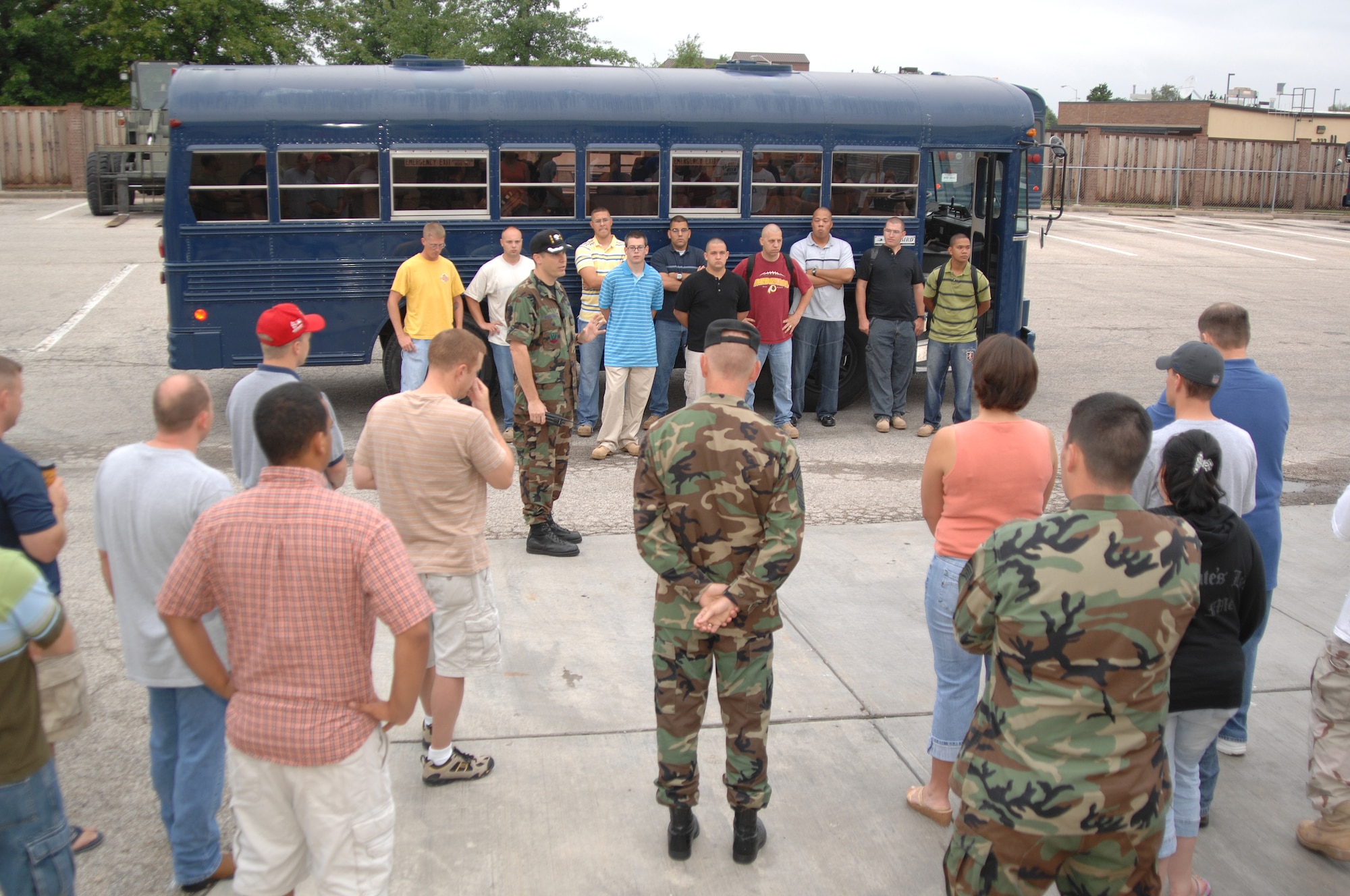 WHITEMAN AIR FORCE BASE, Mo. -  Col. John Robinson (center), 509th Bomb Wing vice commander, speaks to members of the 509th Logistics Readiness Squadron, prior to 509th LRS deployers departing for convoy training, Aug. 25. The LRS vehicle operators will attend a six-week long convoy training course at Camp Bullis, Texas in preparation for their deployment for Kuwait. (U.S. Air Force photo/Senior Airman Lauren Padden)   