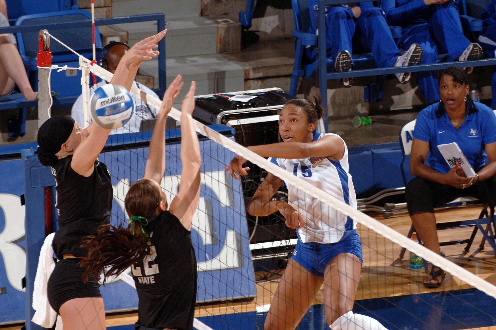 U.S. Air Force Academy Cadet 2nd Class Jasamine Pettie spikes a ball during the Air Force Invitational held Aug. 24 at the Academy in Colorado. The Lady Falcons finished second in the tournament. (U.S. Air Force photo/David Armer)