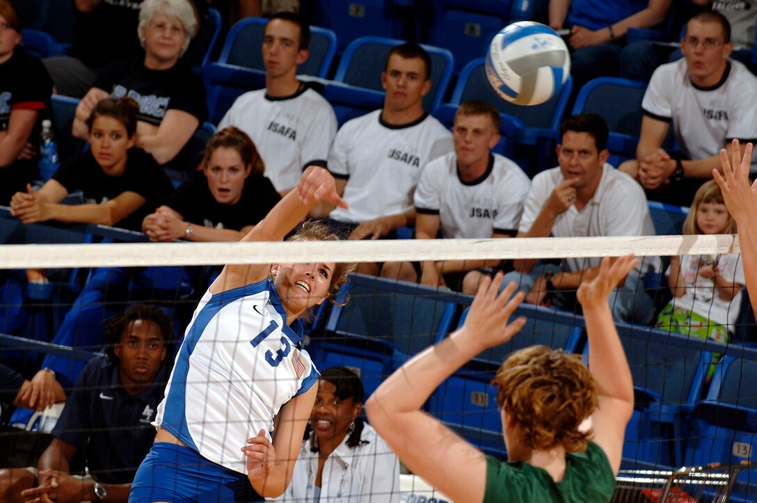 U.S. Air Force Academy freshman Caroline Kurtz delivers one of her four kills against Chicago State Aug. 24 at Clune Arena at the Academy in Colorado. The Falcons swept the Cougars 3-0 on their way to a second place finish in the Air Force Invitational Tournament. (U.S. Air Force photo/Mike Kaplan) 