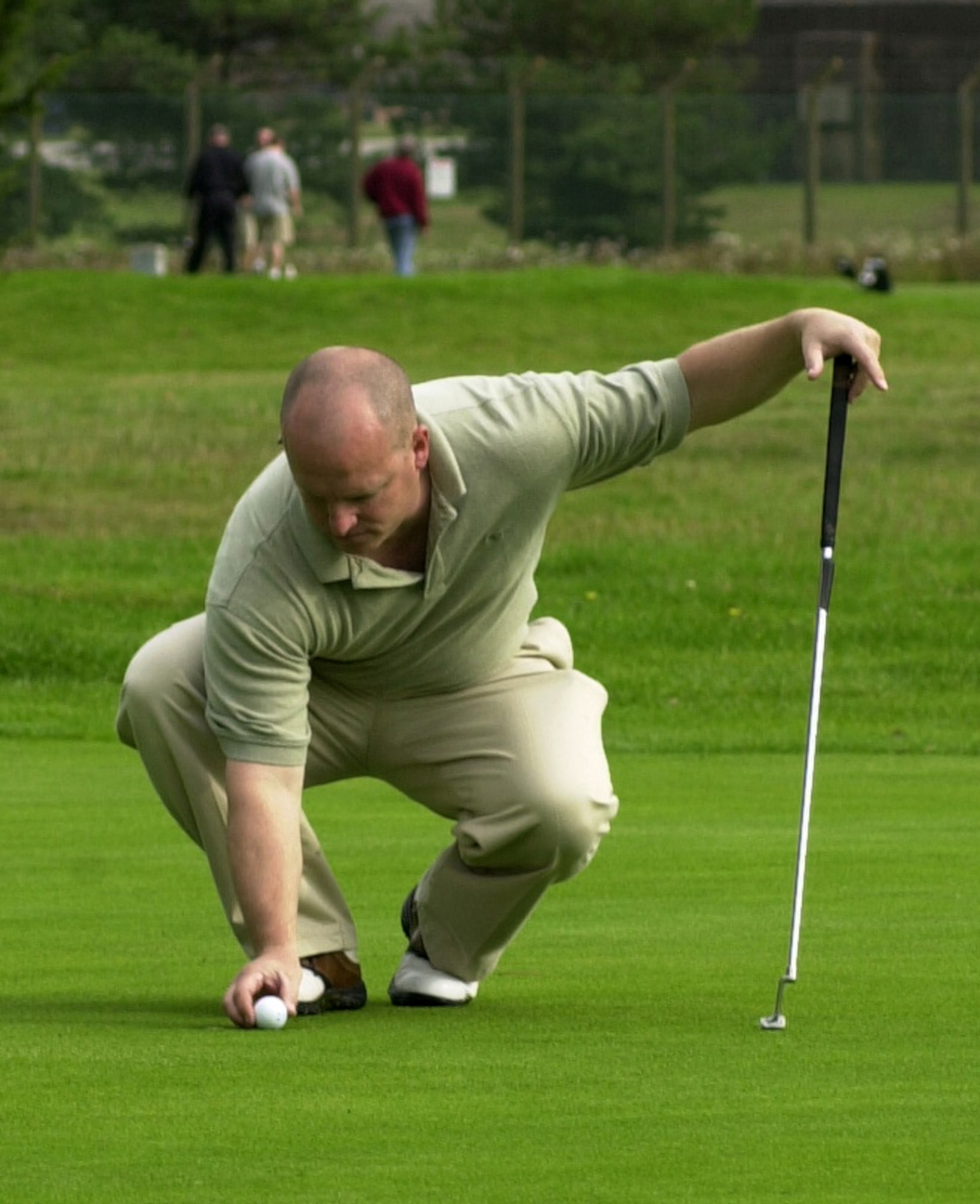 Todd Westhaver, 352nd Maintenance Squadron, lines up a putt on the seventh green in the semi-finals of intramural golf at Breckland Pines Golf Club, Aug. 28. (Air Force photo by Gary Rogers)