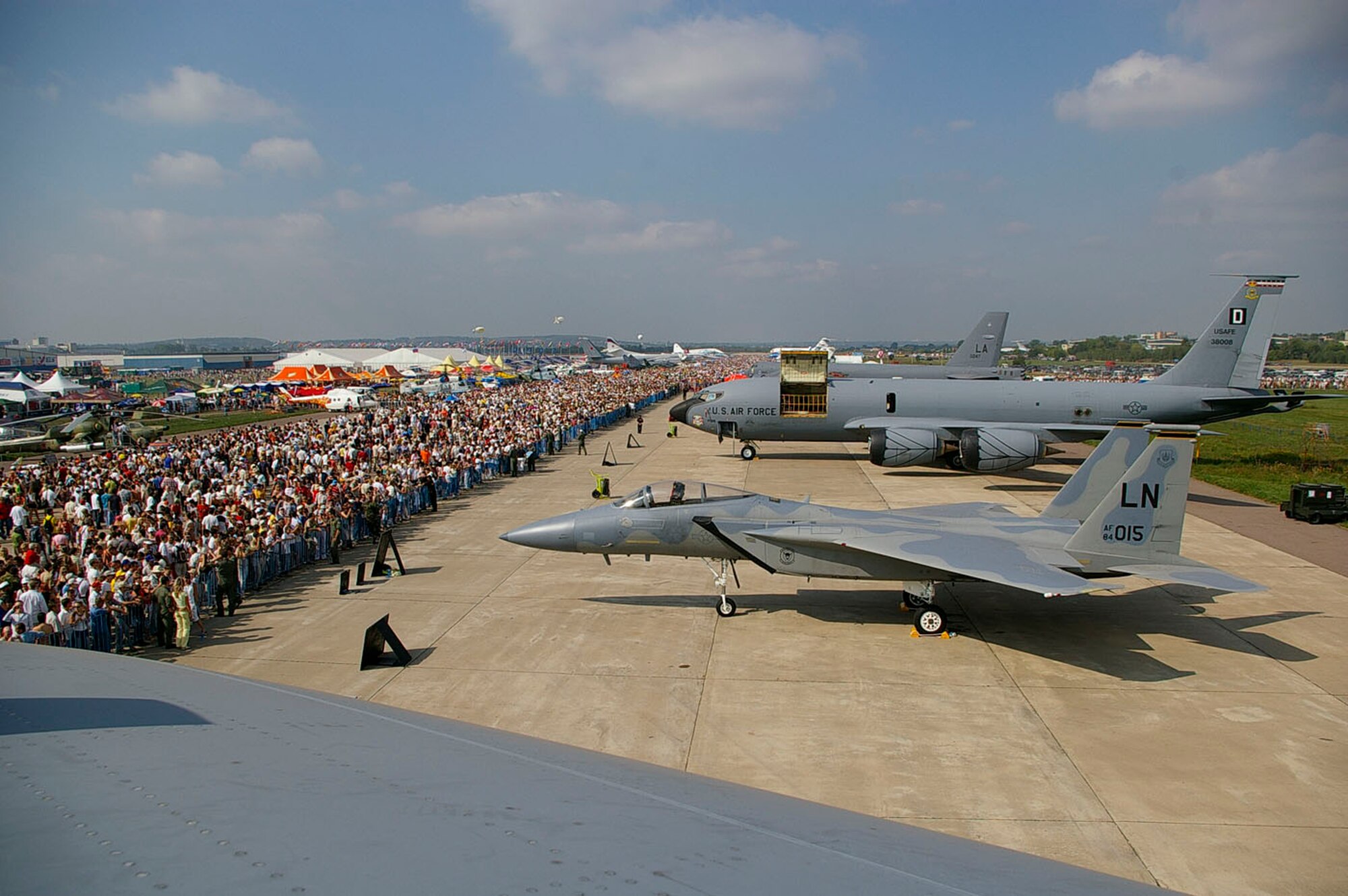 RAMENSKOYE AIRFIELD, Zhukovsky, Russia – The view from the B-52 Stratofortress cockpit shows just some of the thousands of people who visited the Moscow International Air Show Aug. 25. A KC-135 from Royal Air Force Mildenhall, England; an  F-15 from RAF Lakenheath, England; a B-52 from Barksdale Air Force Base, La.; a C-17 from McChord Air Force Base, Wash. and two F-16s from Spangdahlem Air Base, Germany, were used as static displays at the air show, along with other aircraft from all over the world. (U.S. Air Force photo by Karen Abeyasekere)