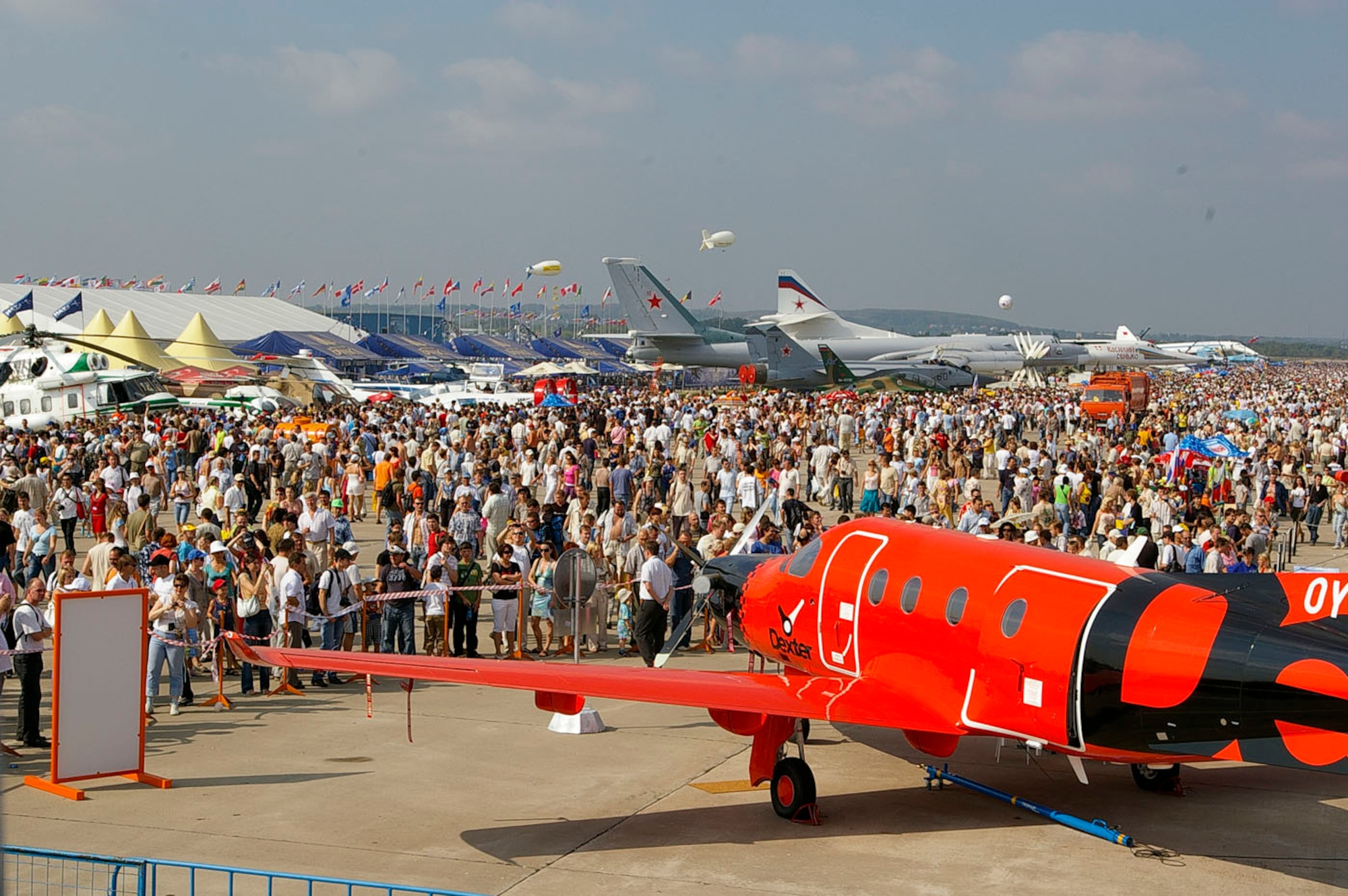 RAMENSKOYE AIRFIELD, Zhukovsky, Russia – The view from the B-52 Stratofortress cockpit shows just some of the thousands of people who visited the Moscow International Air Show Aug. 25. A KC-135 from Royal Air Force Mildenhall, England; an  F-15 from RAF Lakenheath, England; a B-52 from Barksdale Air Force Base, La.; a C-17 from McChord Air Force Base, Wash. and two F-16s from Spangdahlem Air Base, Germany, were used as static displays at the air show, along with other aircraft from around the world. (U.S. Ai r Force photo by Karen Abeyasekere)