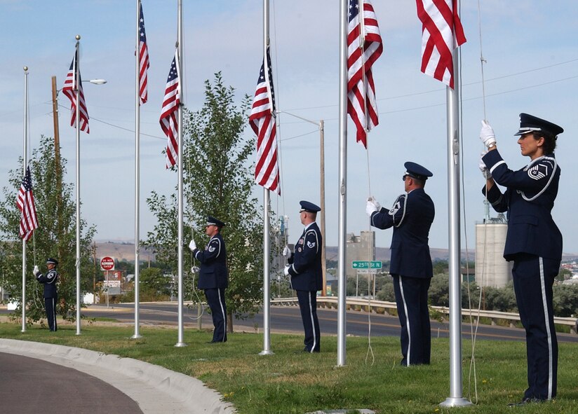 Members of the Montana Air National Guard Honor Guard present the colors to support "Operation Care Package" held at the Montana Veteran's Memorial in Great Falls Aug. 27. The United Services Organiztion in conjunction with a national financial company is touring 70 cities to collect donations for care packages that will be sent to deployed servicemembers. (U.S. Air Force photo/Airman 1st Class Dillon White) 