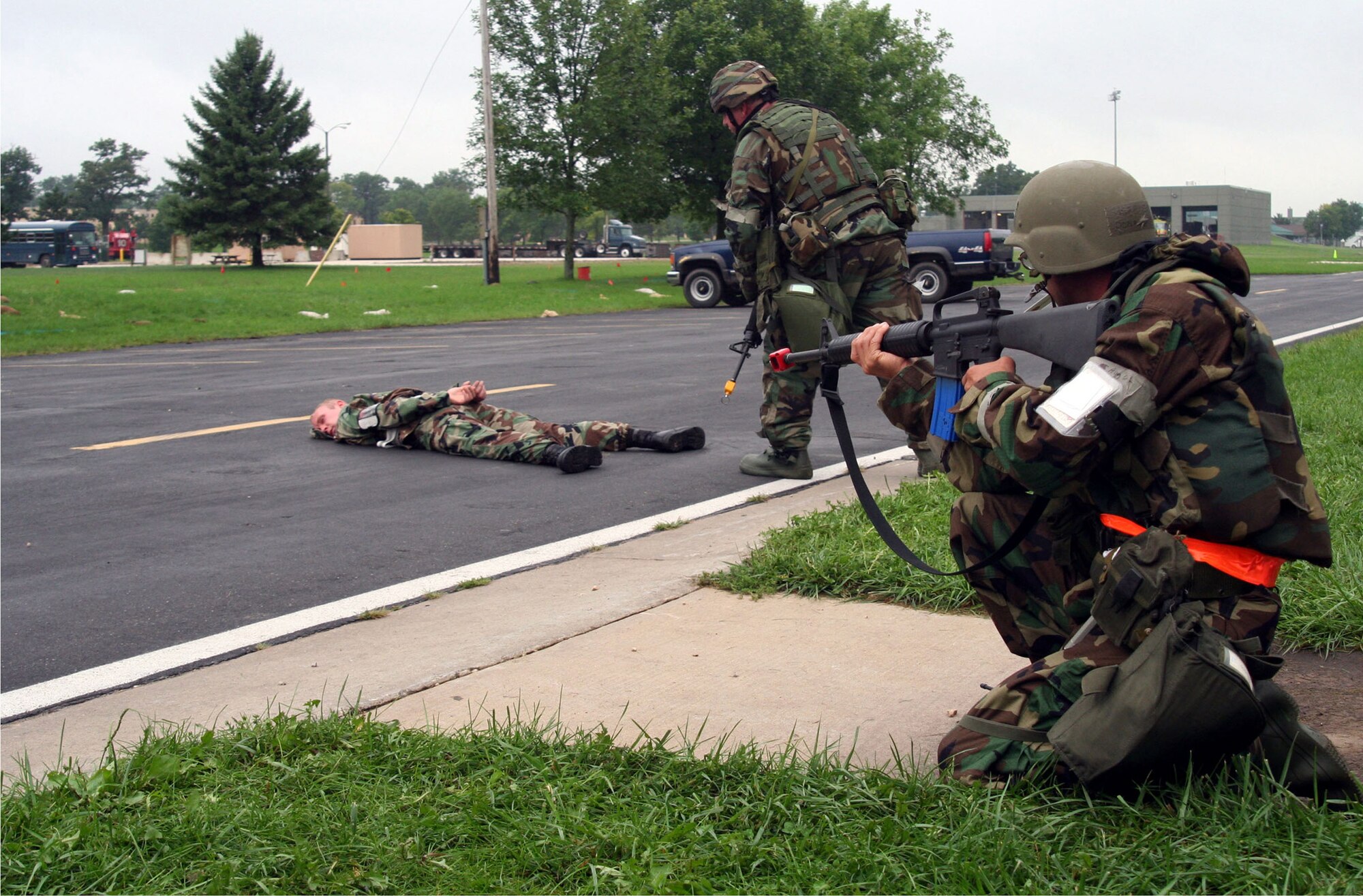 VOLK FIELD, Wis. - 445th Airlift Wing Security Forces subdue an airman in a scenario for OPERATION READINESS SAFEGUARD at Volk Field, Wis.  The wing participated in the exercise to prepare for their upcoming Operation Readiness Inspection. (U.S. Air Force photo/Tech. Sgt. Charlie Miller)