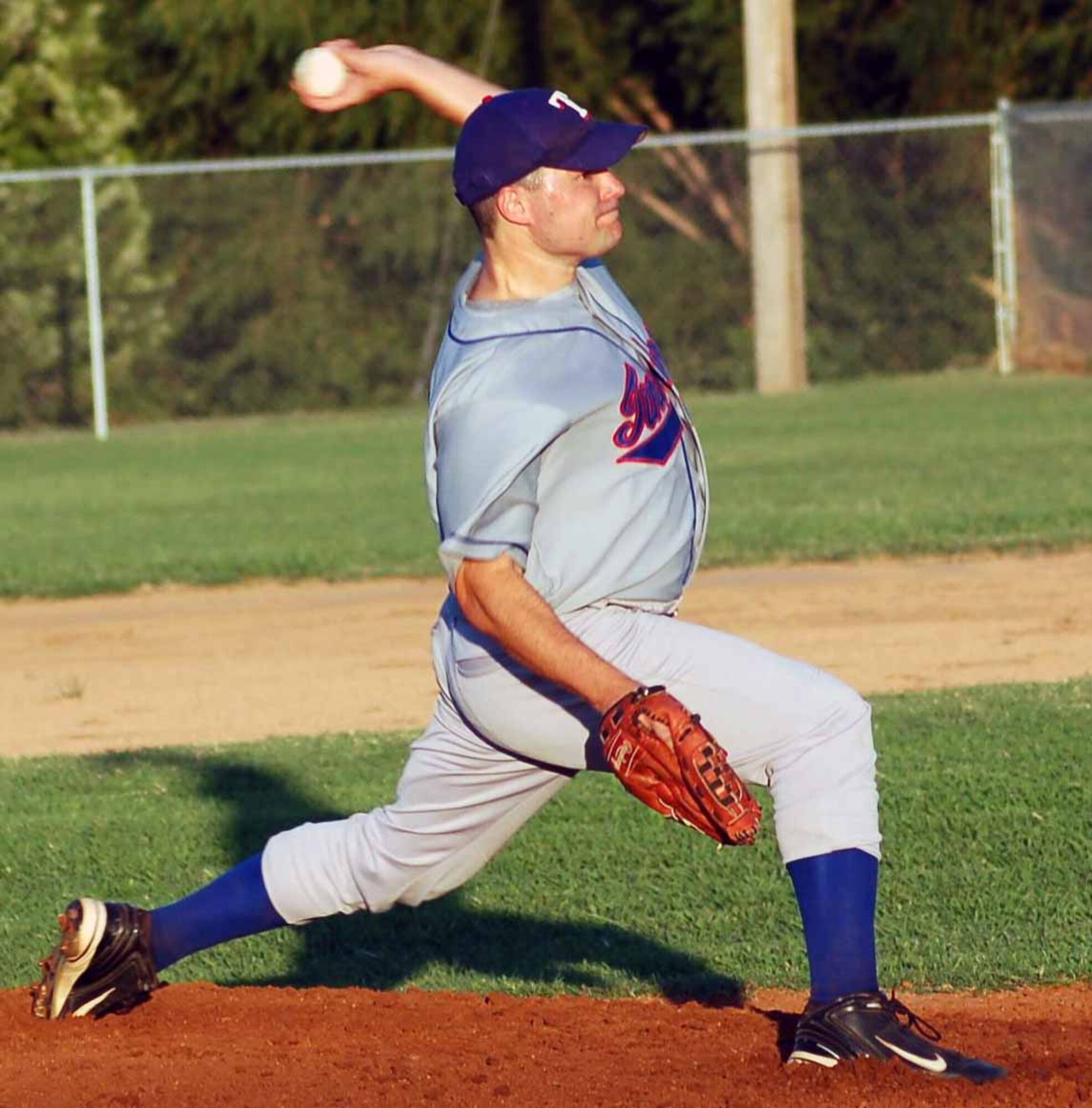 Tinker Rangers pitcher Stephen Escalante delivers a pitch in the first inning of a game against Team Dynasty Aug. 22 at Lake Hefner Park. The Rangers fell to the Dynasty 9-5. (Air Force photo by John E. Banks)