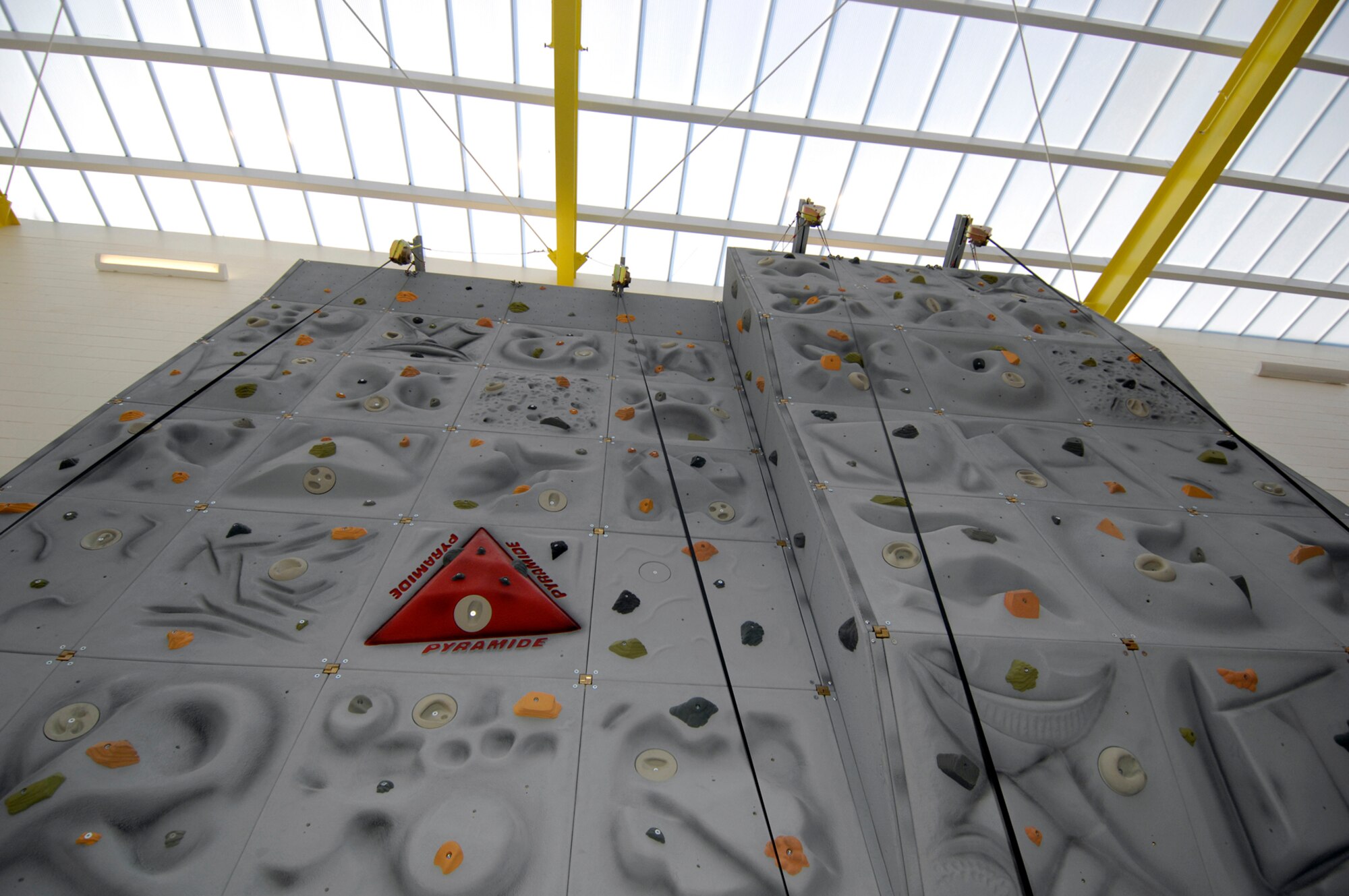 Hanscom Air Force Base, Mass. -- The new Fitness and Sports Center will feature a rock climbing wall, which will be located near the main entrance of the facility. There will be a ribbon cutting ceremony at 10:30 a.m. followed by tours of the facility from 11 a.m. to noon. The new fitness center will be open for use at noon. (U.S. Air Force photo by Mark Wyatt)