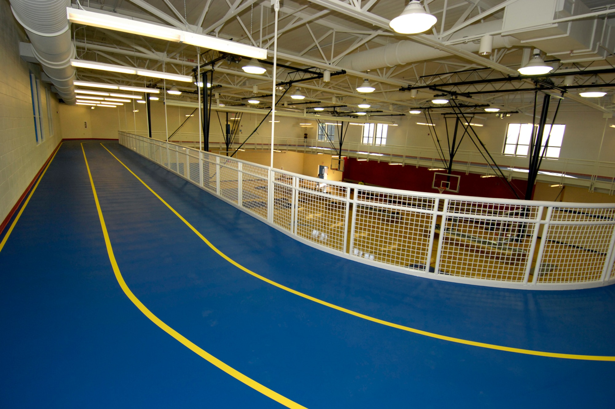 Hanscom Air Force Base, Mass. -- The new Fitness and Sports Center has an indoor running track located above the multipurpose gymnasium, which has an NCAA-sized basketball court. (U.S. Air Force photo by Mark Wyatt)