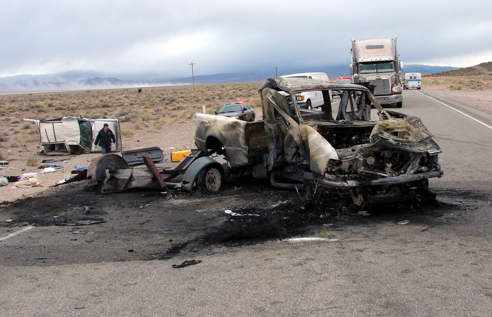 Mr. Juan Trillo, a contractor with the 98th Range Wing Support Services Group, pulled the injured driver of this now unrecognizable 2007 Ford pickup truck after a car wreck that involved three vehicles May 4th, 2007.  The driver was unable to free himself from the burning vehicle because of the damage that the door received during the wreck. (courtesy photo)